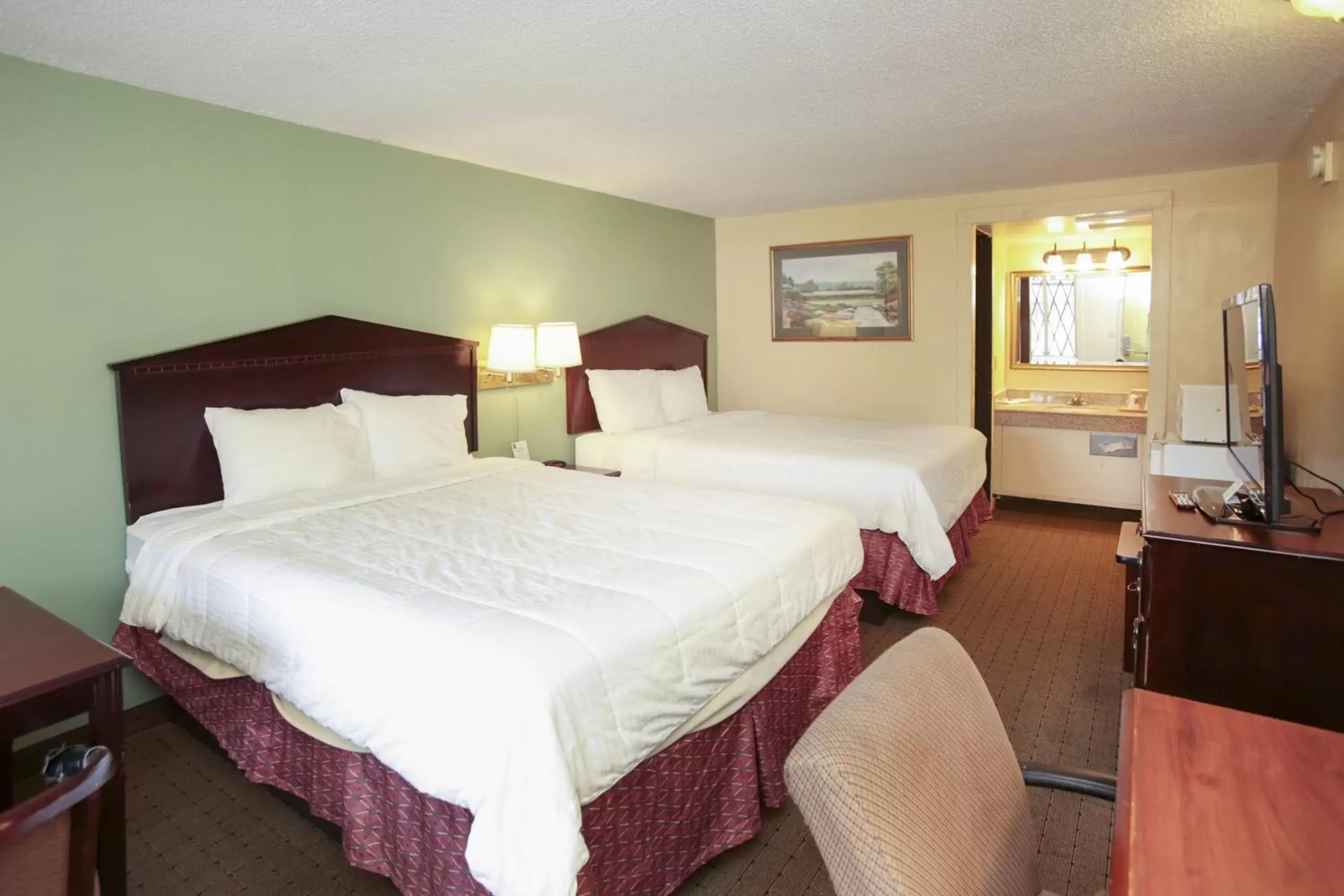 Bedroom, Bed in Knights Inn - Battle Creek Bedroom, Bed in Knights Inn - Battle Creek