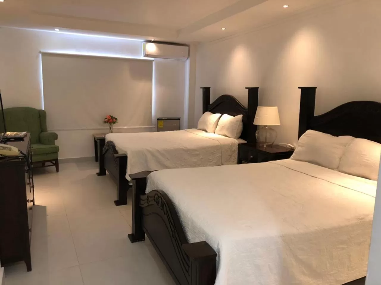 Bed in Golden House Hotel & Convention Center