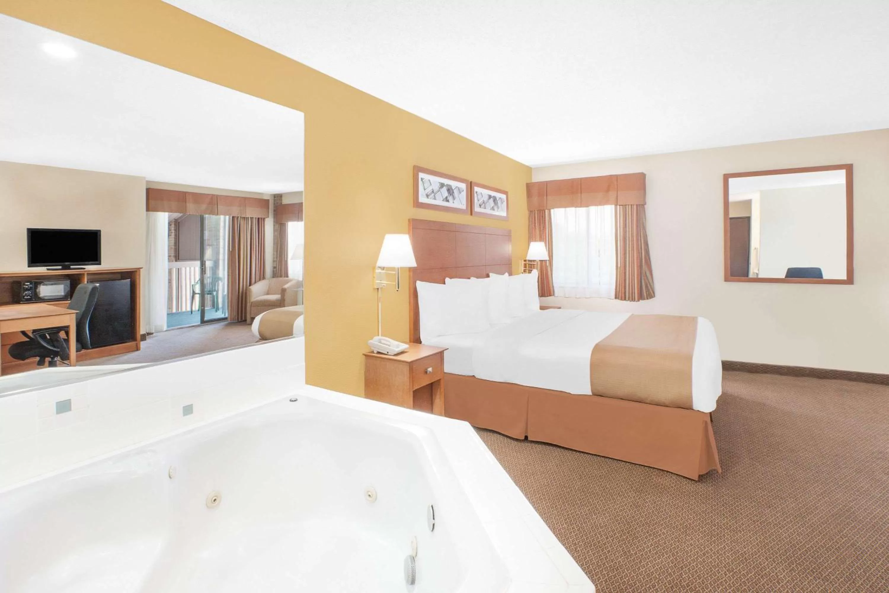Photo of the whole room, Bed in Baymont by Wyndham Port Huron
