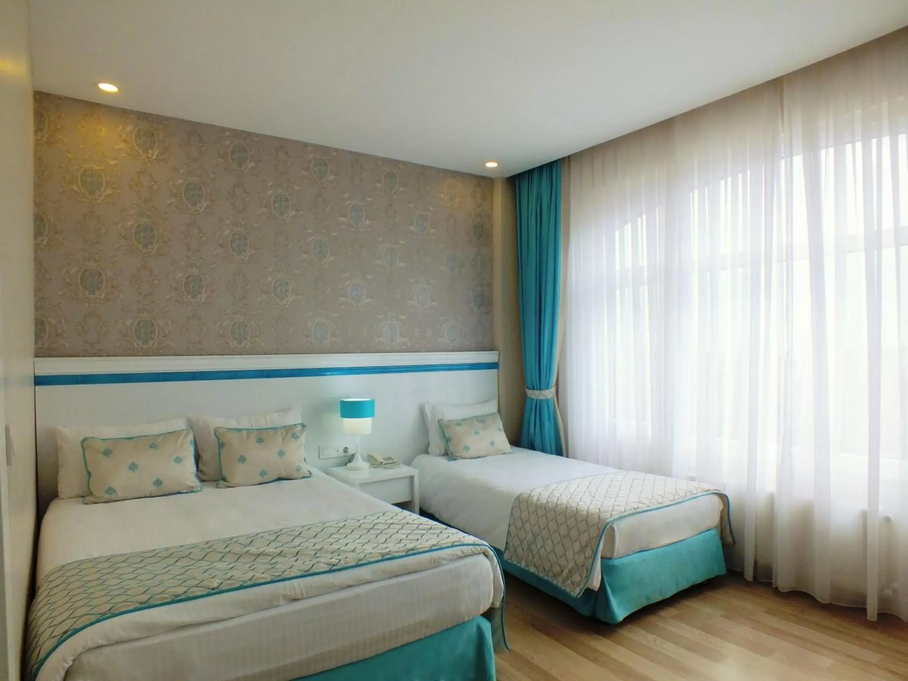 Photo of the whole room, Bed in Star Holiday Hotel