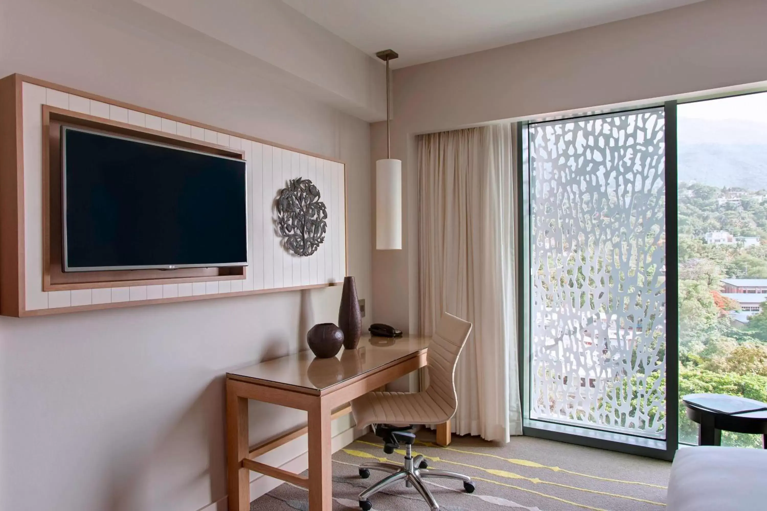 Photo of the whole room, TV/Entertainment Center in Marriott Port-au-Prince Hotel