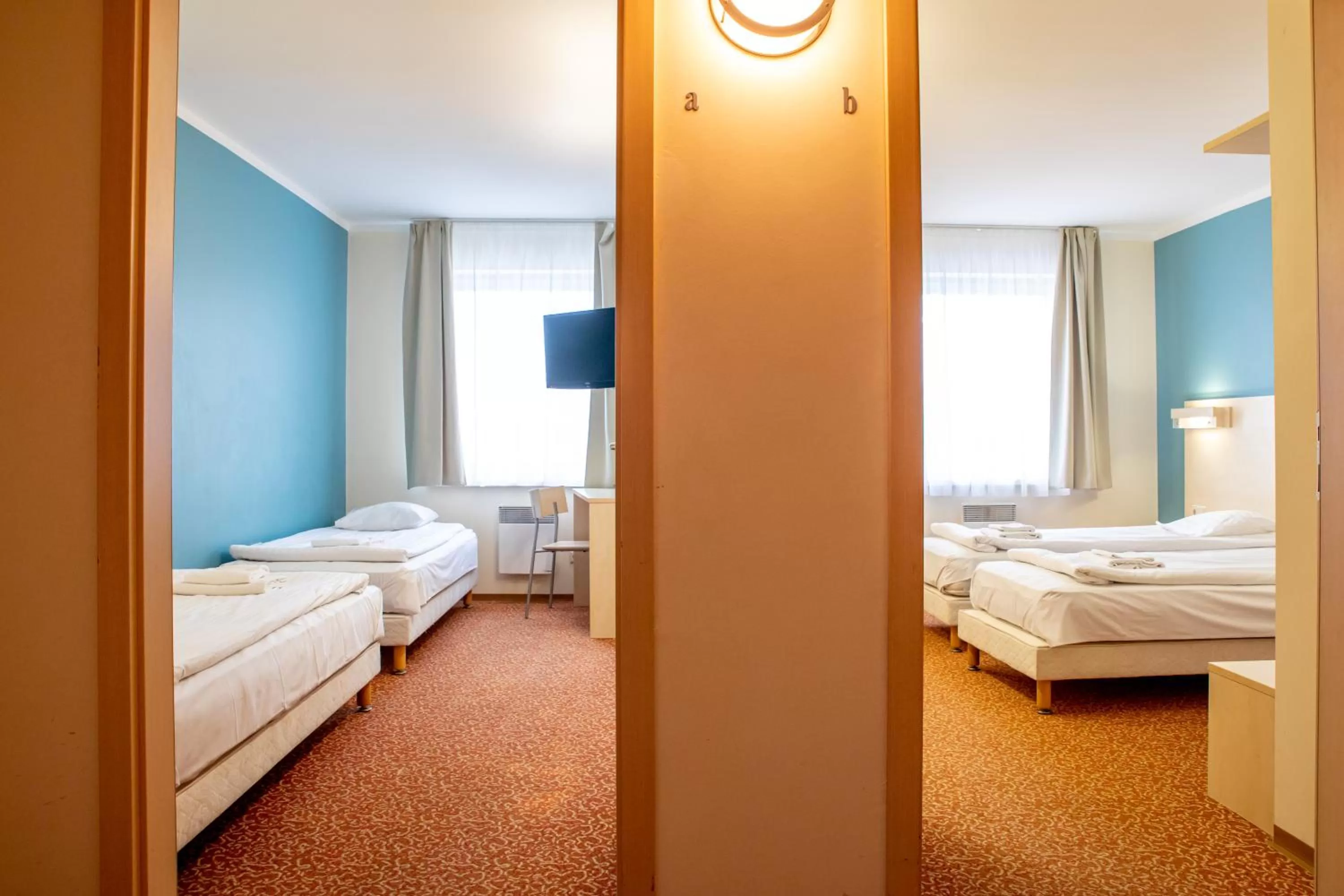 Bed in Rija Bauska Hotel