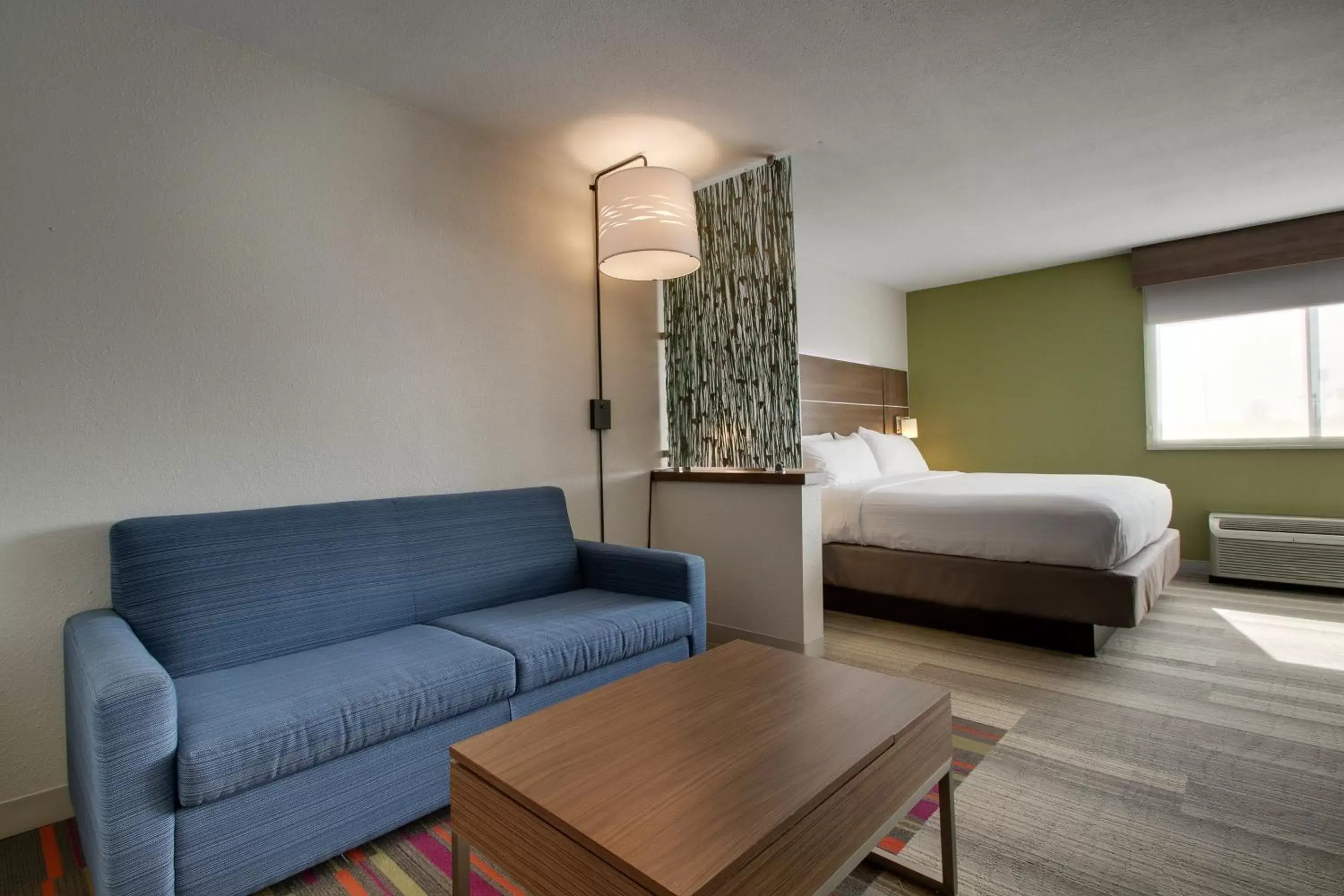 Bedroom, Seating Area in Holiday Inn Express & Suites Wapakoneta, an IHG Hotel