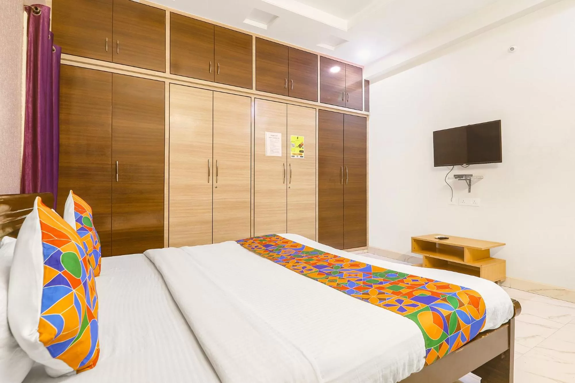 Communal lounge/ TV room, Bed in FabExpress Golden Gate - Nr Hitech City