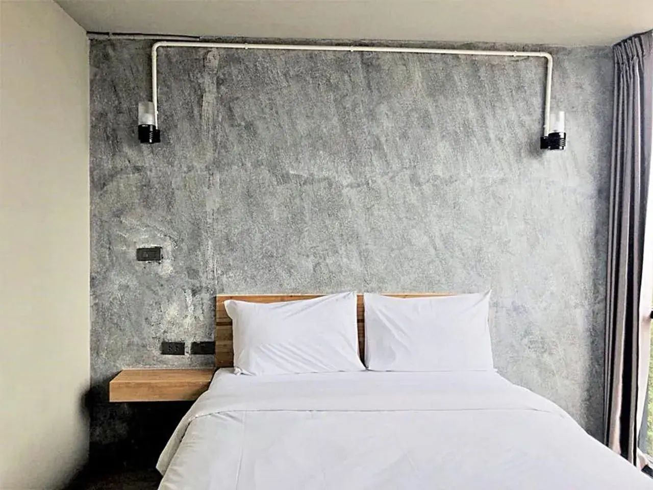 Bed in IZEN Budget Hotel & Residences (Plus)