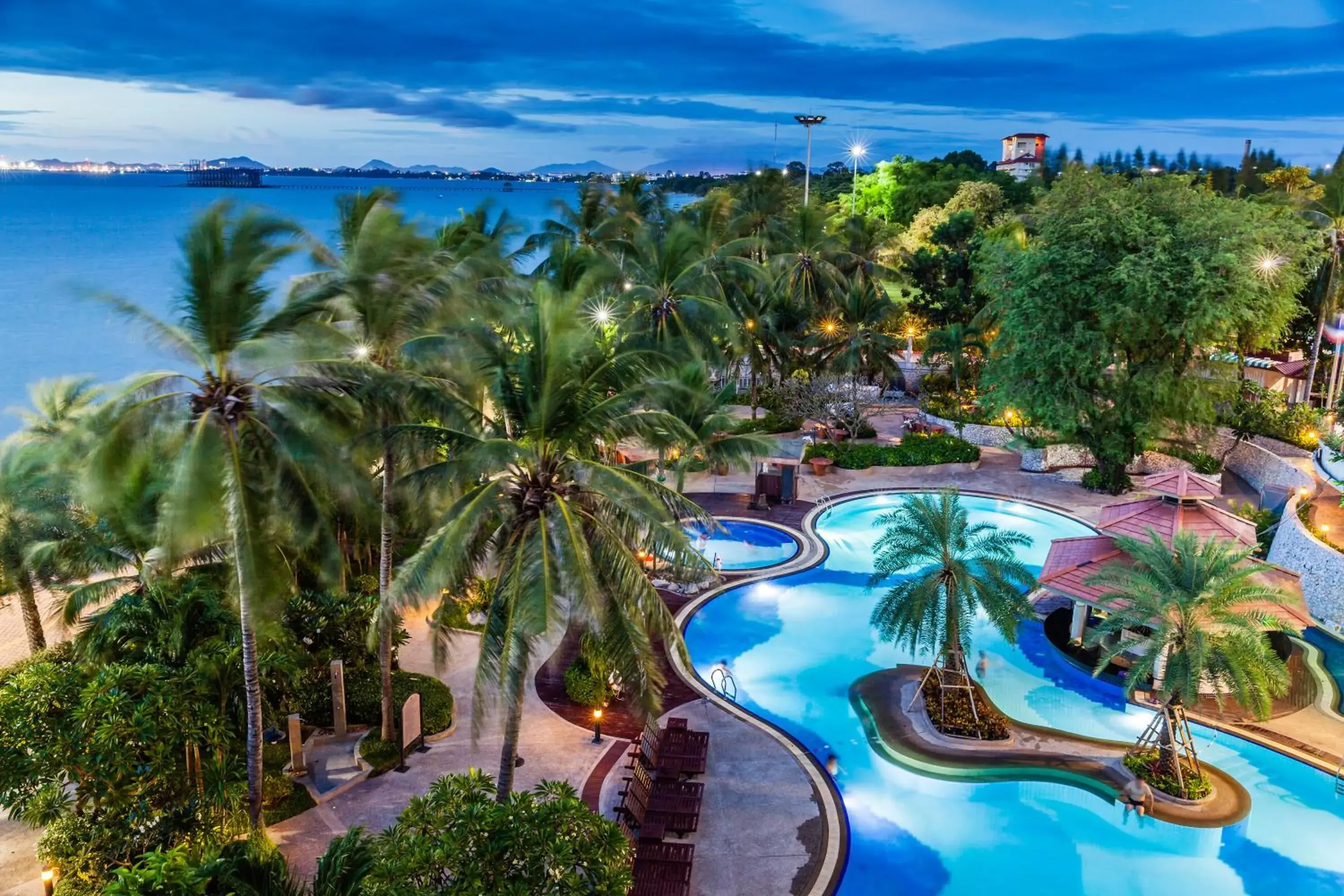 Swimming pool, Bird's-eye View in Cholchan Pattaya Beach Resort - SHA Extra Plus