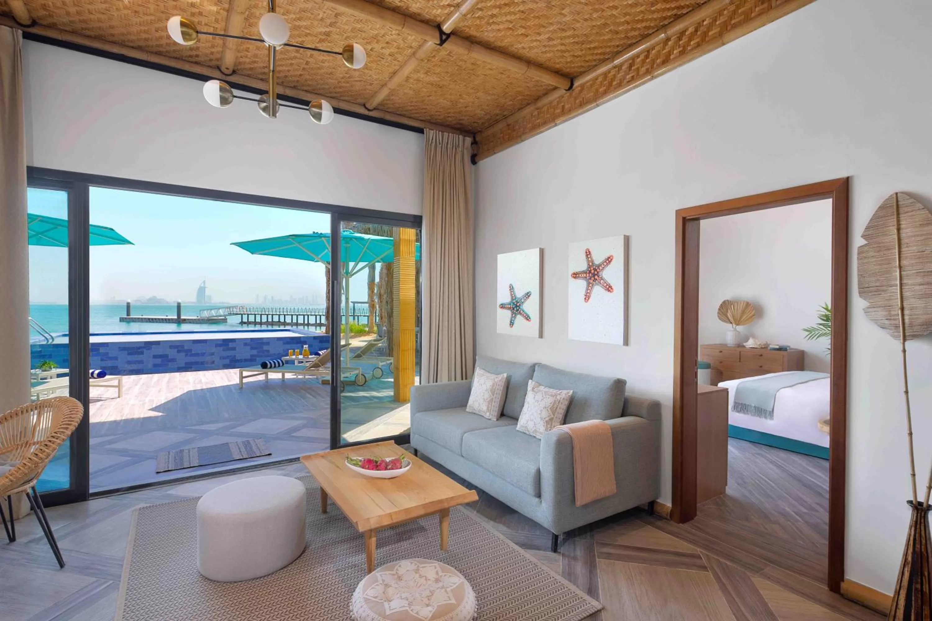 Living room, Bed in Anantara World Islands Dubai Resort