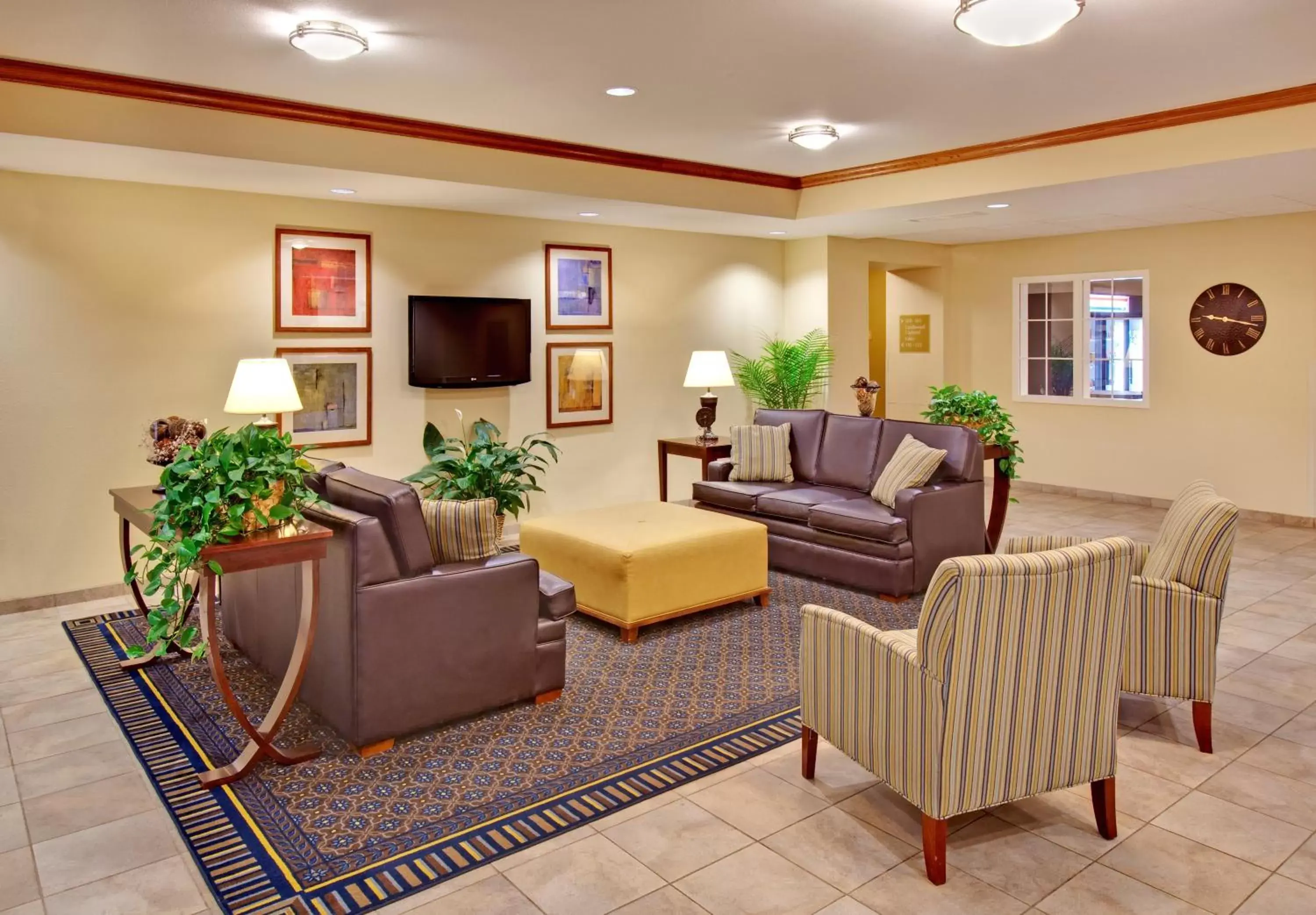 Property building, Seating Area in Candlewood Suites Williston, an IHG Hotel