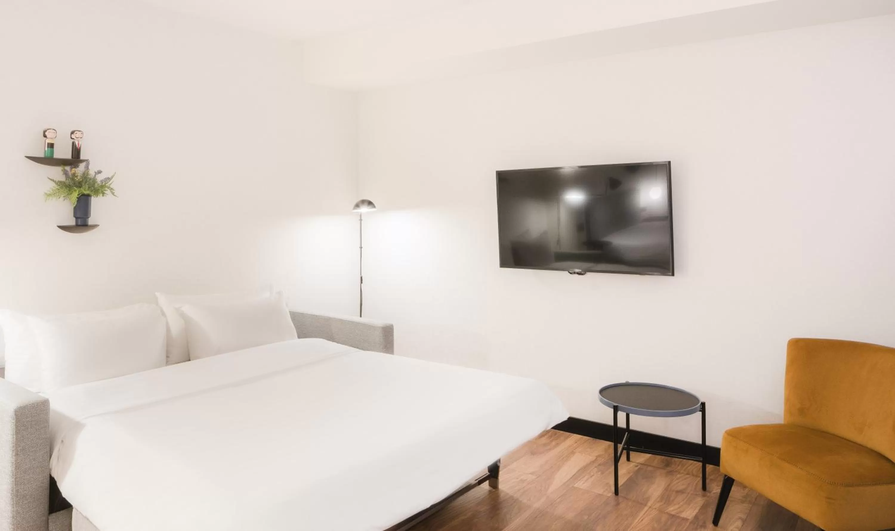 Bed in Radisson Blu 1882 Hotel, Barcelona Sagrada Familia