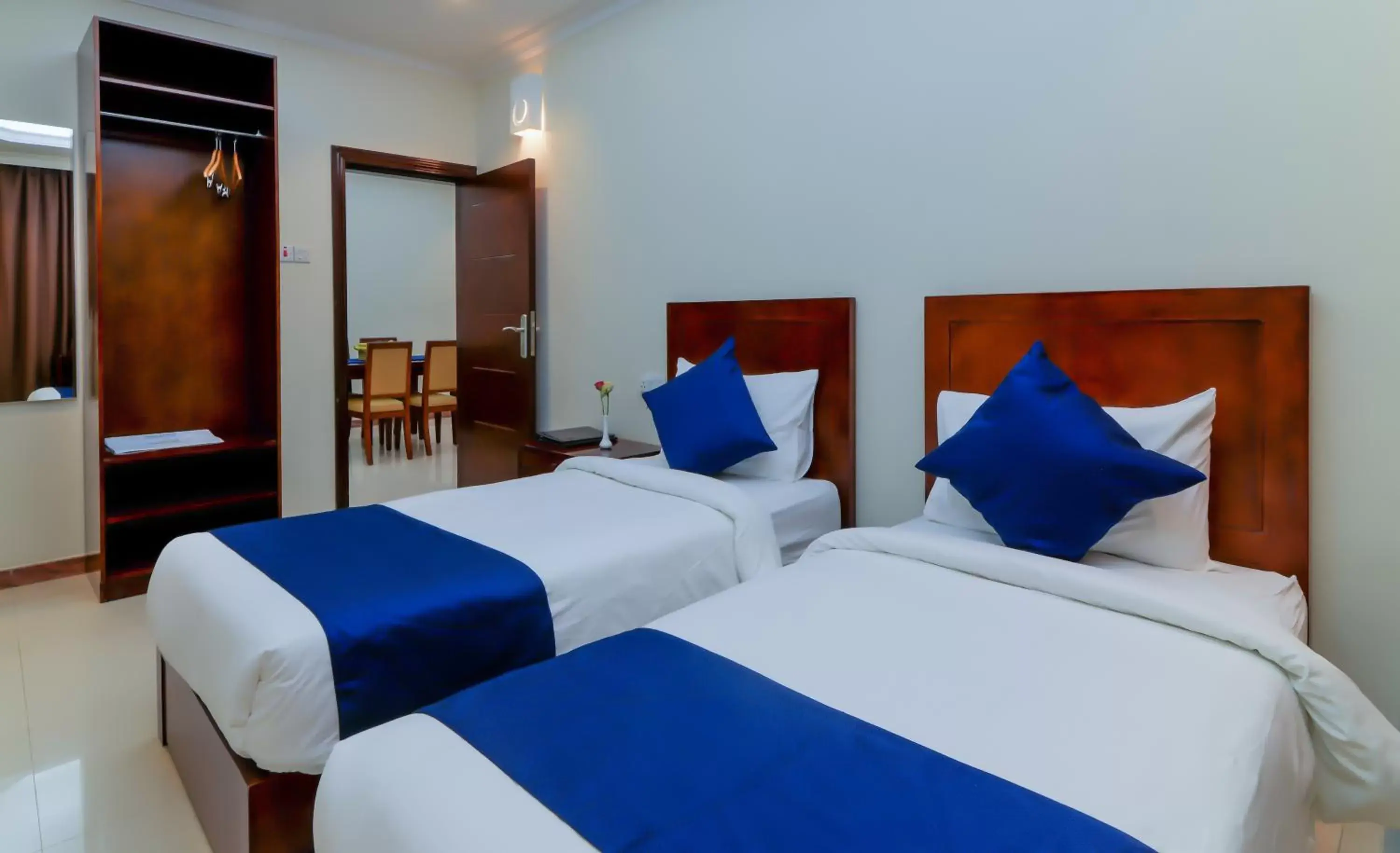 Bedroom, Bed in Tanzanite Executive Suites