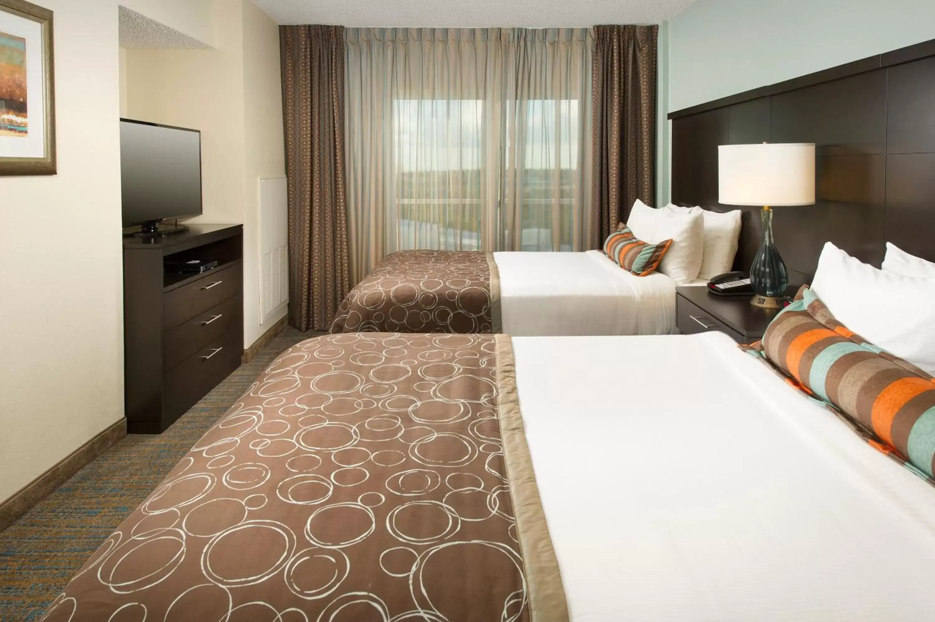 Photo of the whole room, Bed in Staybridge Suites Myrtle Beach-Fantasy Harbour, an IHG Hotel