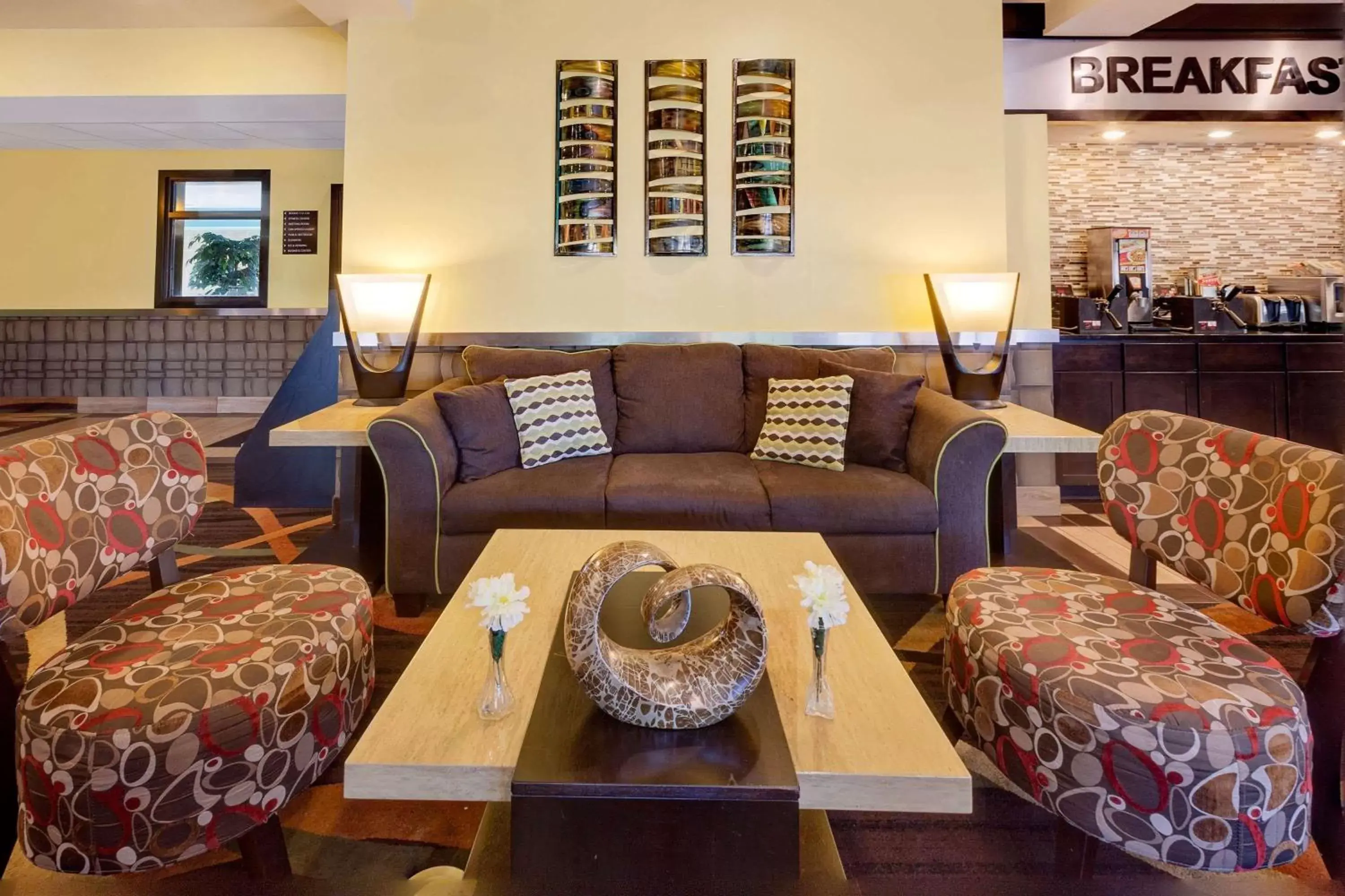 Lobby or reception in Super 8 by Wyndham Akron S/Green/Uniontown OH Lobby or reception in Super 8 by Wyndham Akron S/Green/Uniontown OH