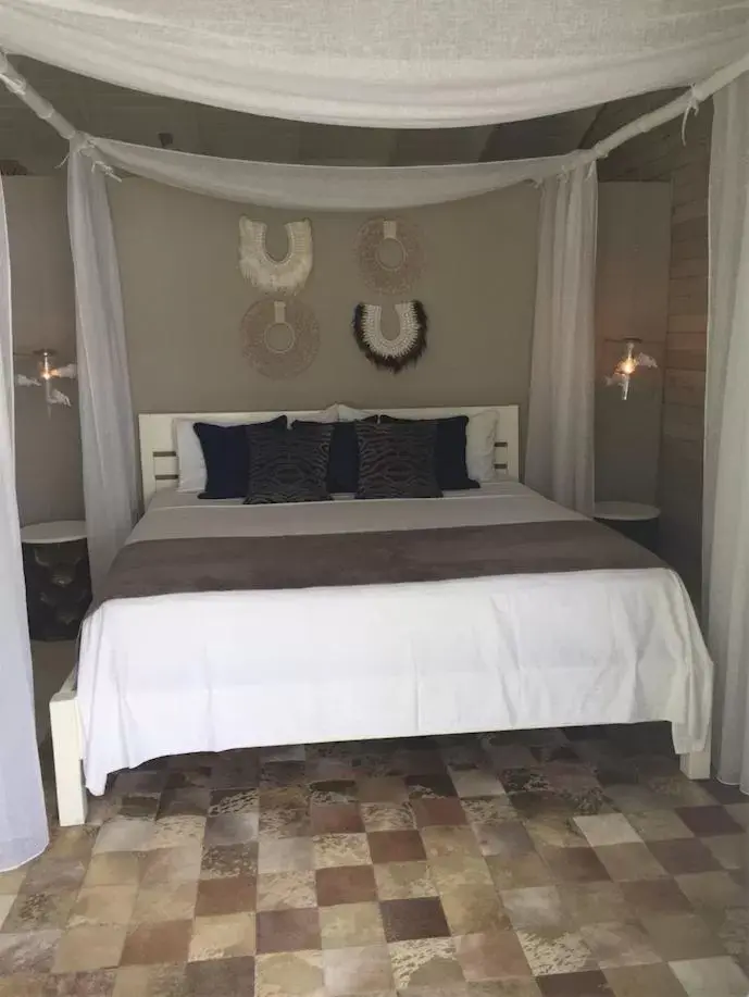 Bed in Mahona Boutique Hotel