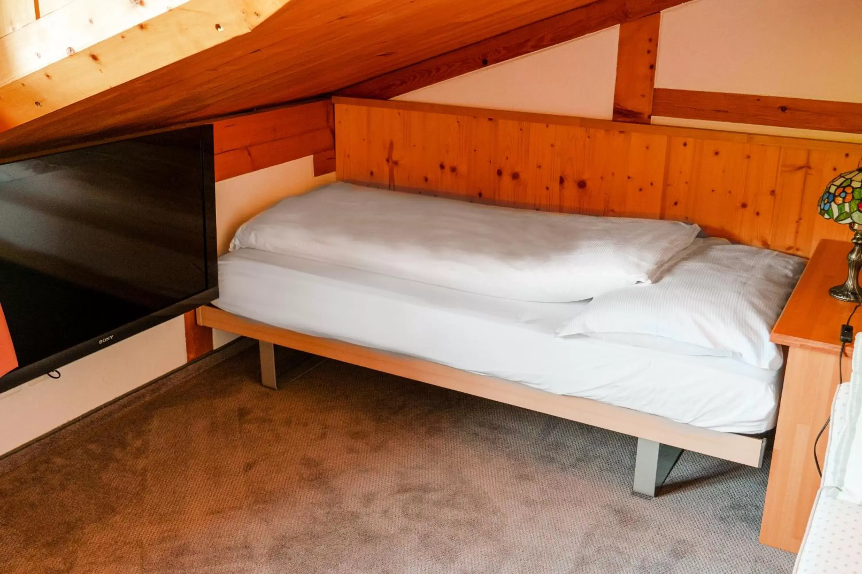 Bed in Hillsite Hotel Restaurant Flims