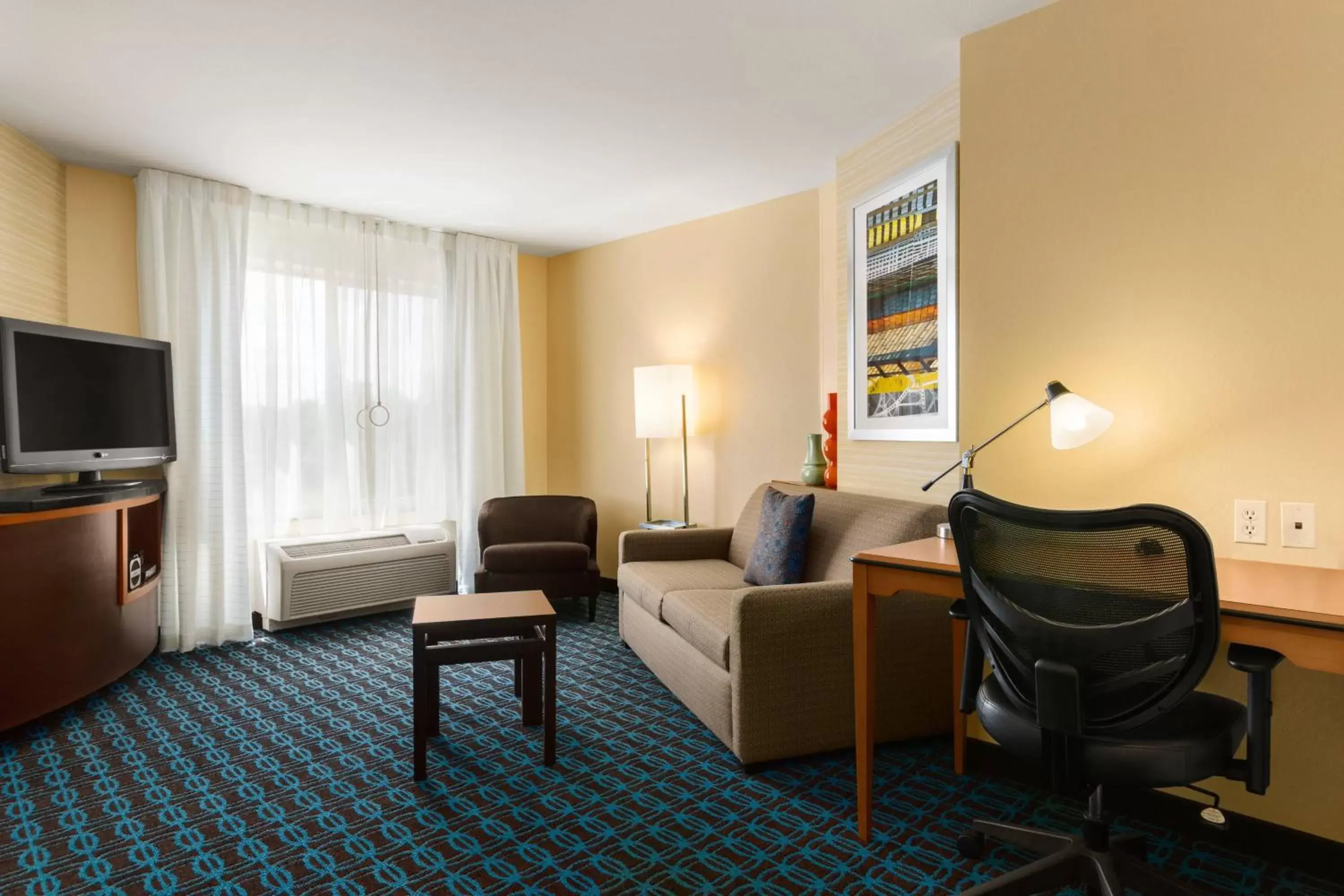 Bedroom, Seating Area in Fairfield Inn & Suites by Marriott Weirton