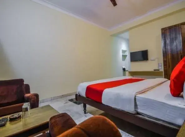 Bed in Hotel Vinayakam