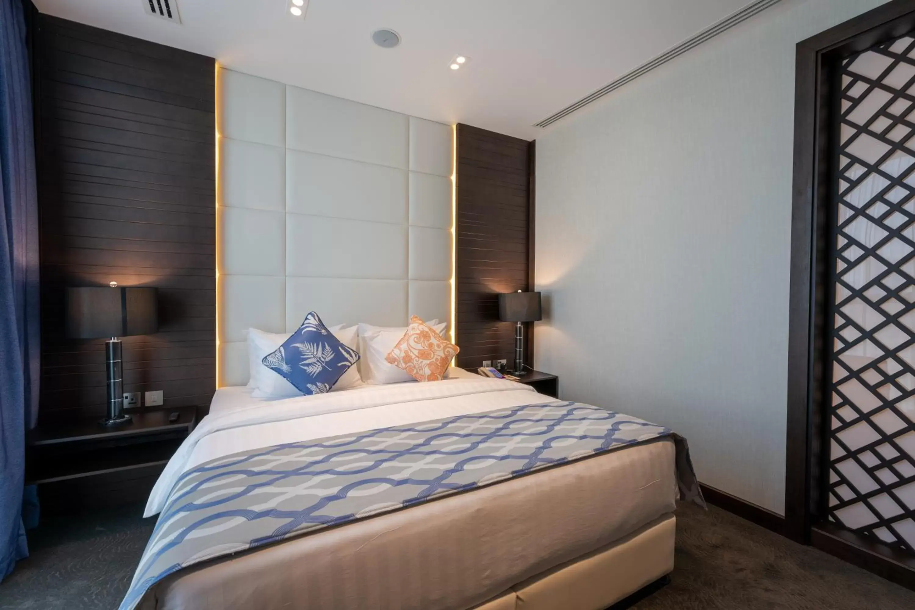 Bed in Ramada Encore Doha by Wyndham