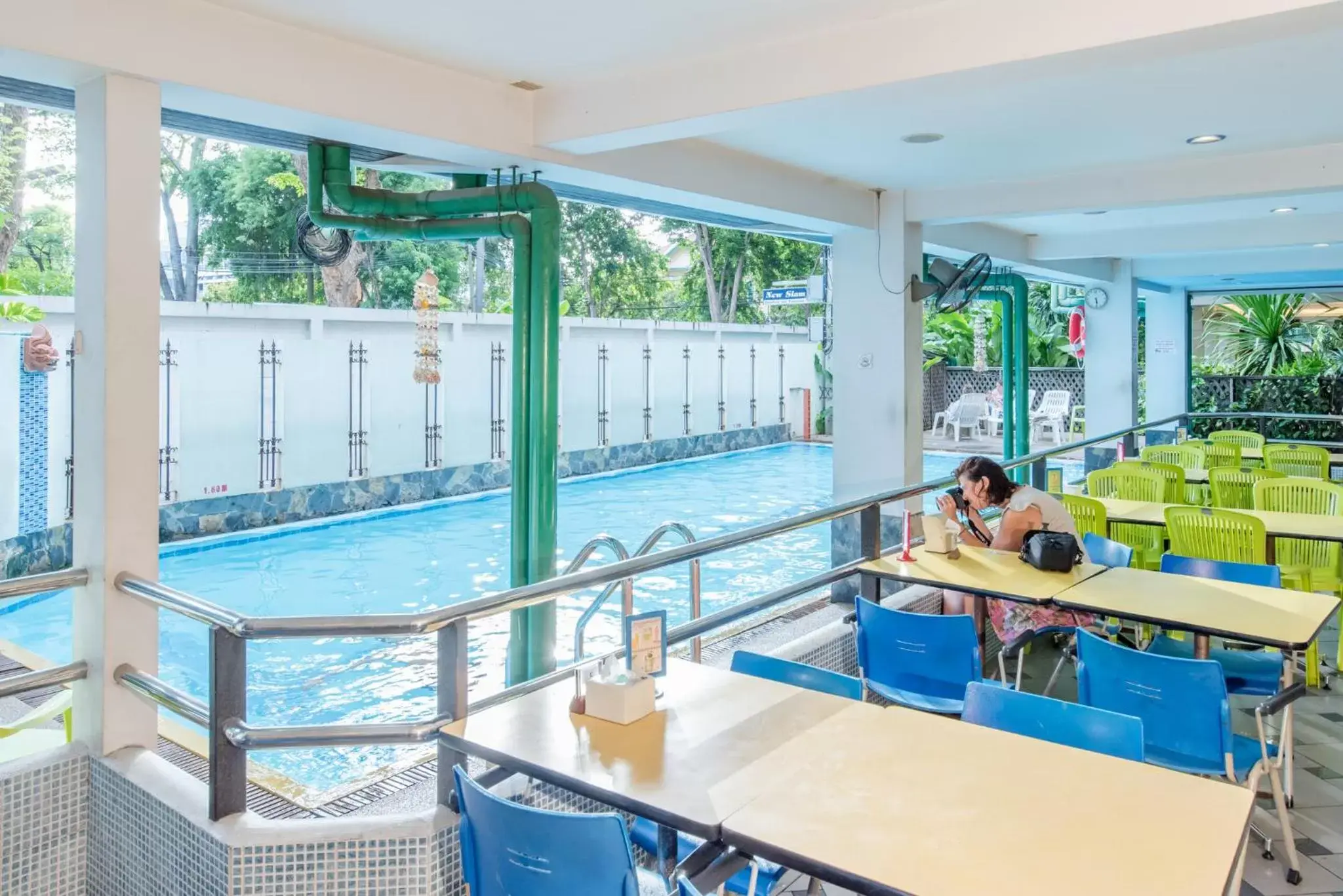 Dining area, Swimming Pool in New Siam II - SHA Certified