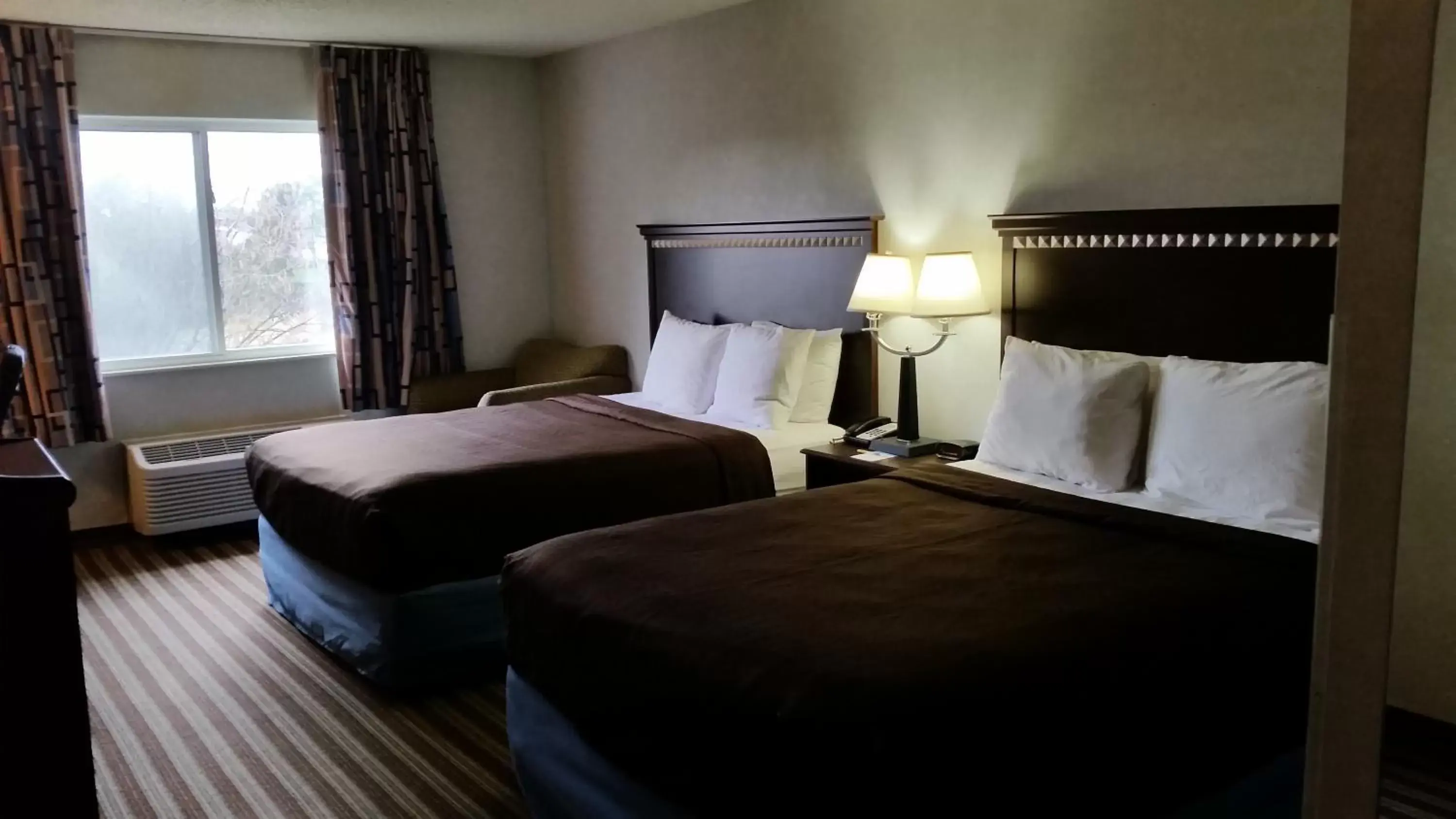 Photo of the whole room, Bed in Days Inn & Suites by Wyndham Vancouver