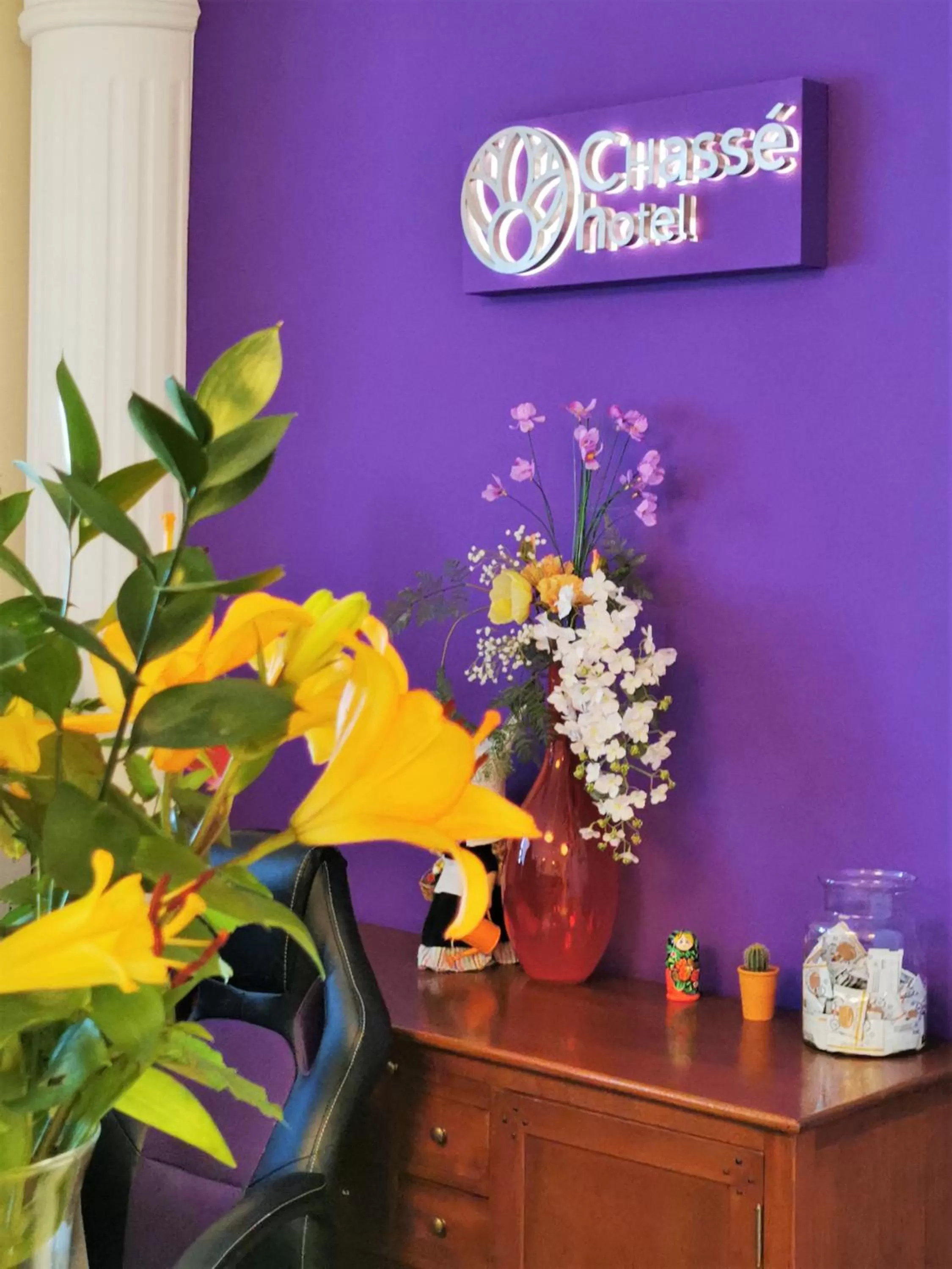 Property logo or sign in Chasse Boutique Hotel