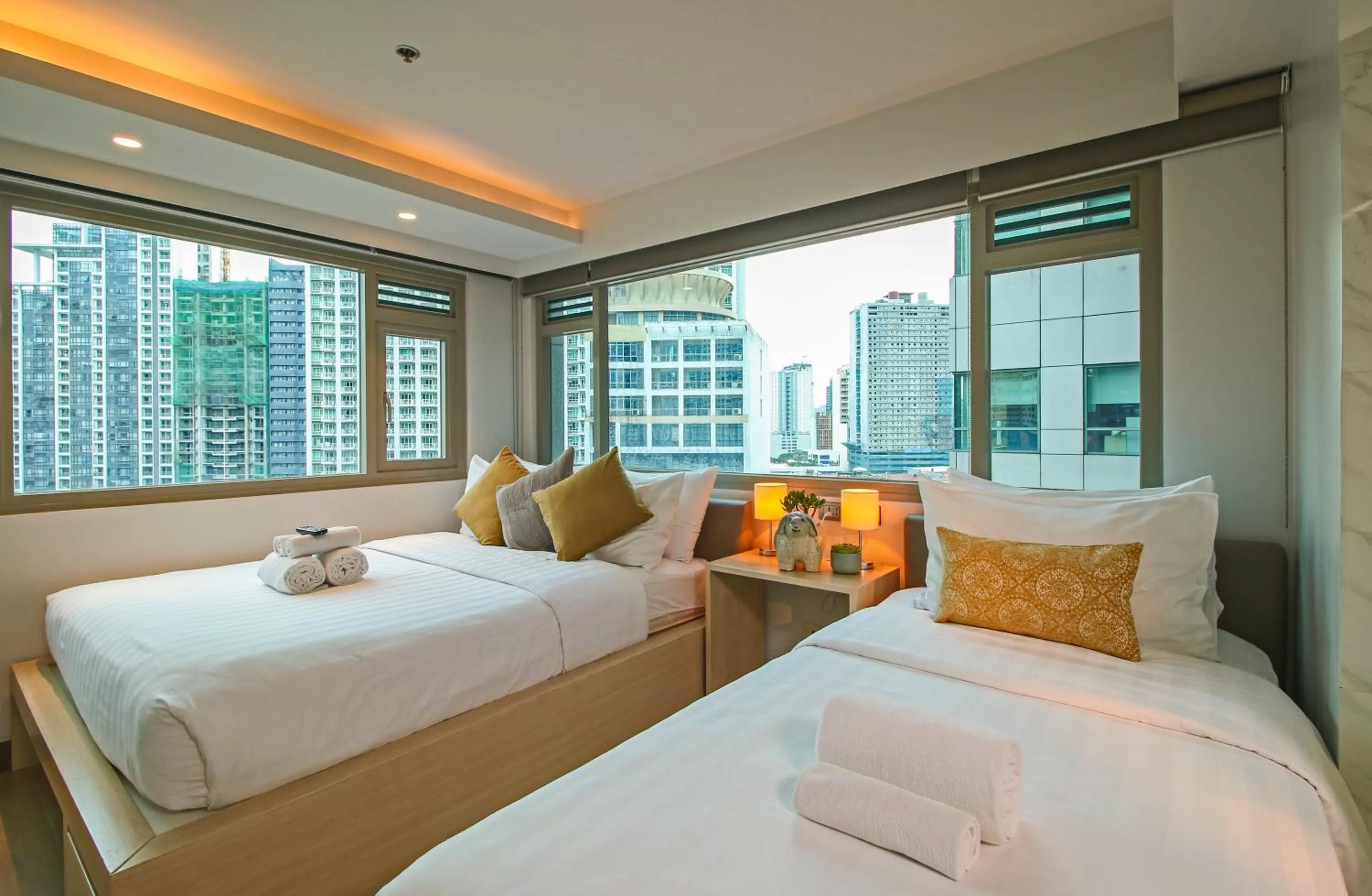 View (from property/room), Bed in The Mini Suites Eton Tower Makati