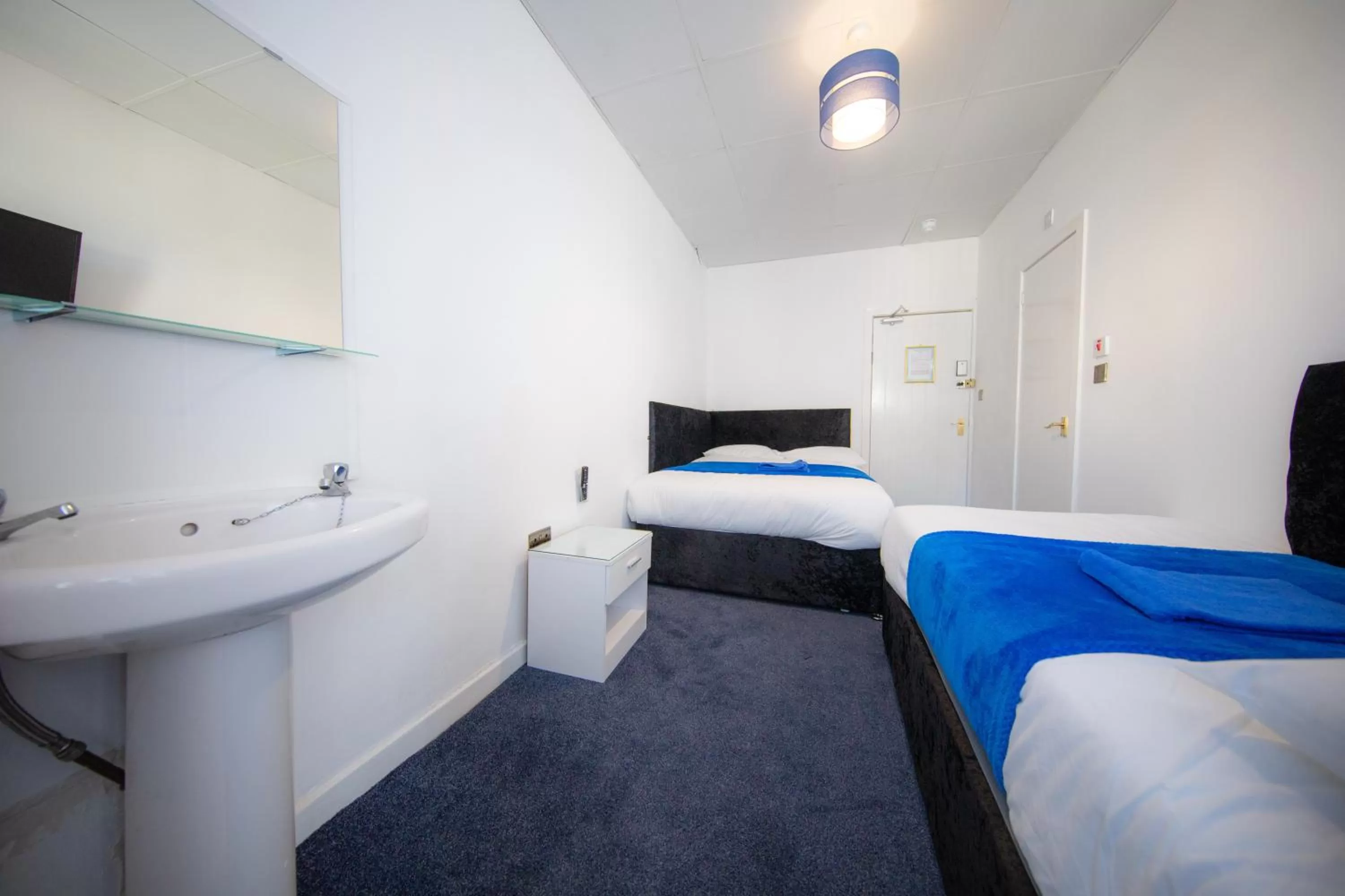 Bed in The Adonis Hotel