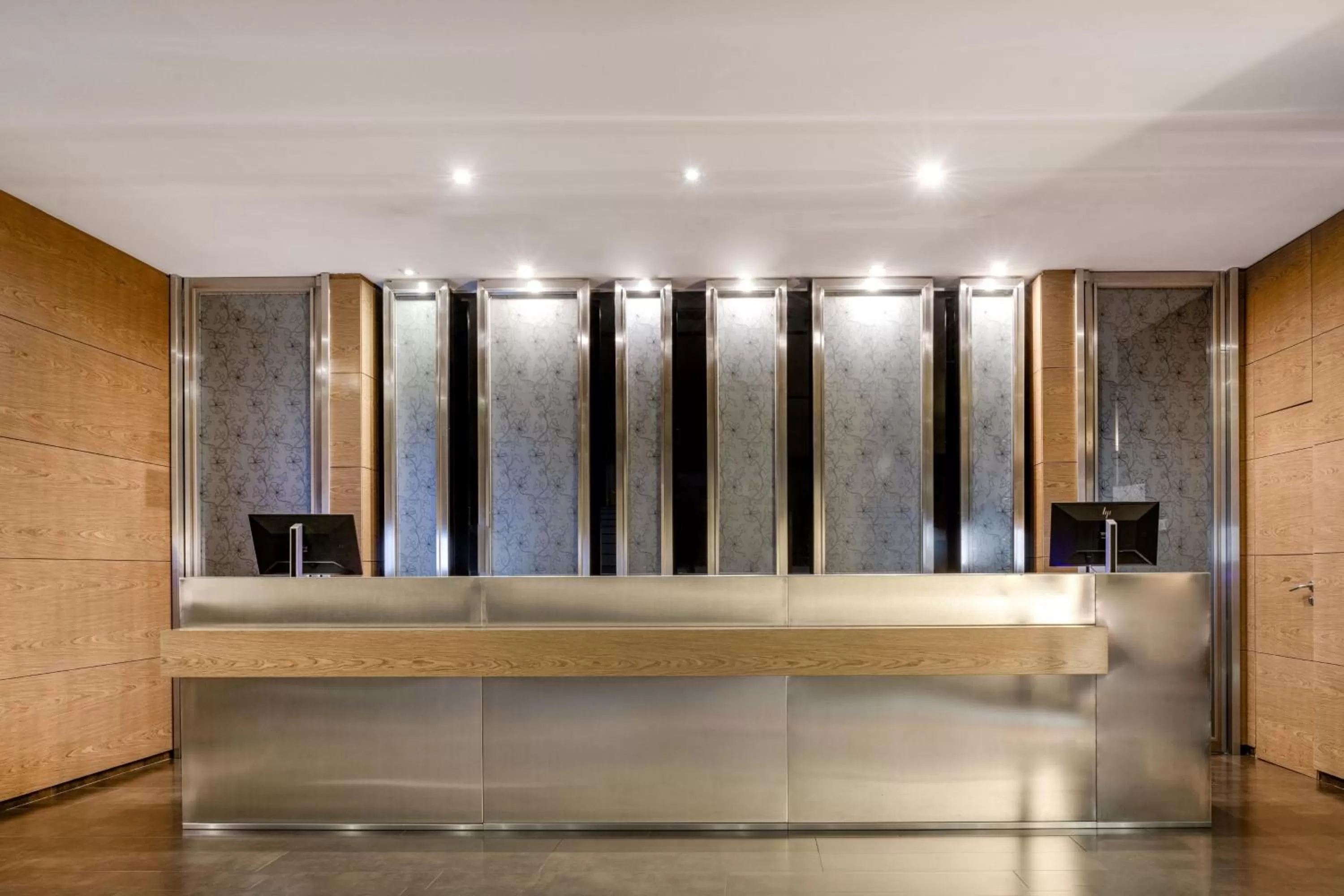 Lobby or reception in AC Hotel Brescia by Marriott