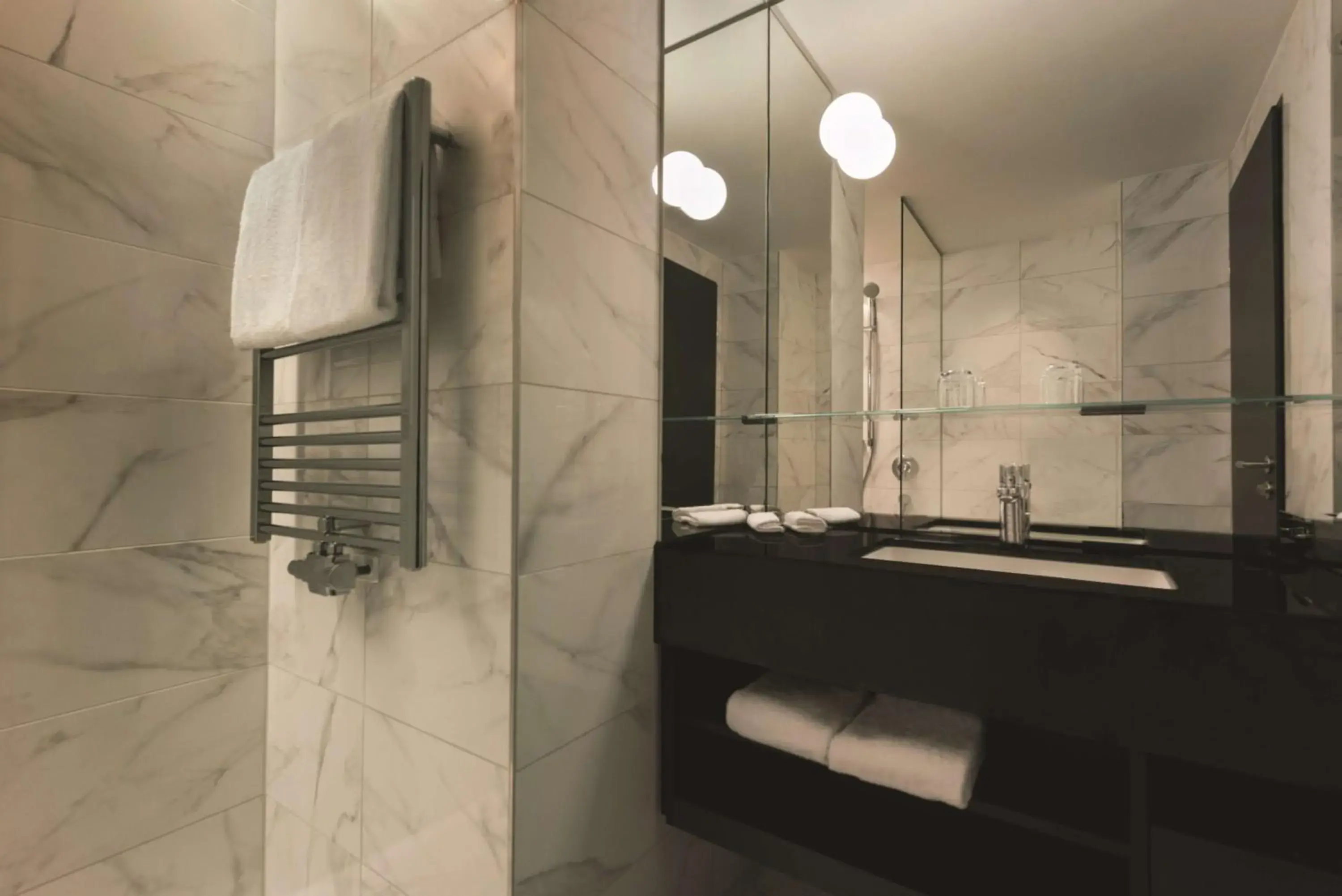 Bathroom in Adina Apartment Hotel Frankfurt Westend