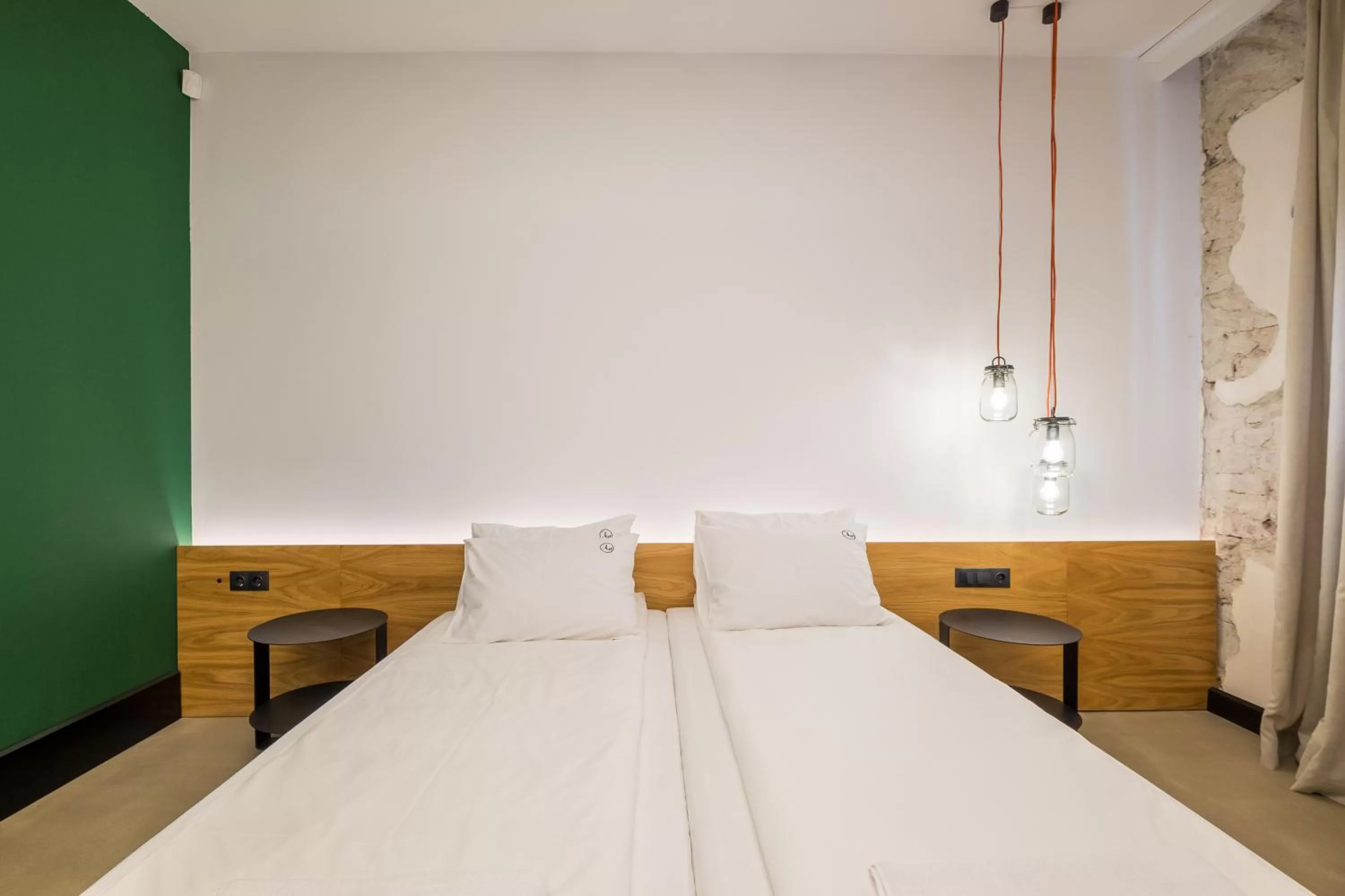 Bed in R34 Boutique Hotel