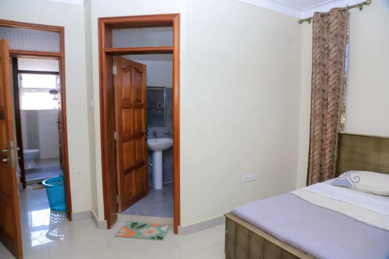 Bed in Karibu Namugongo