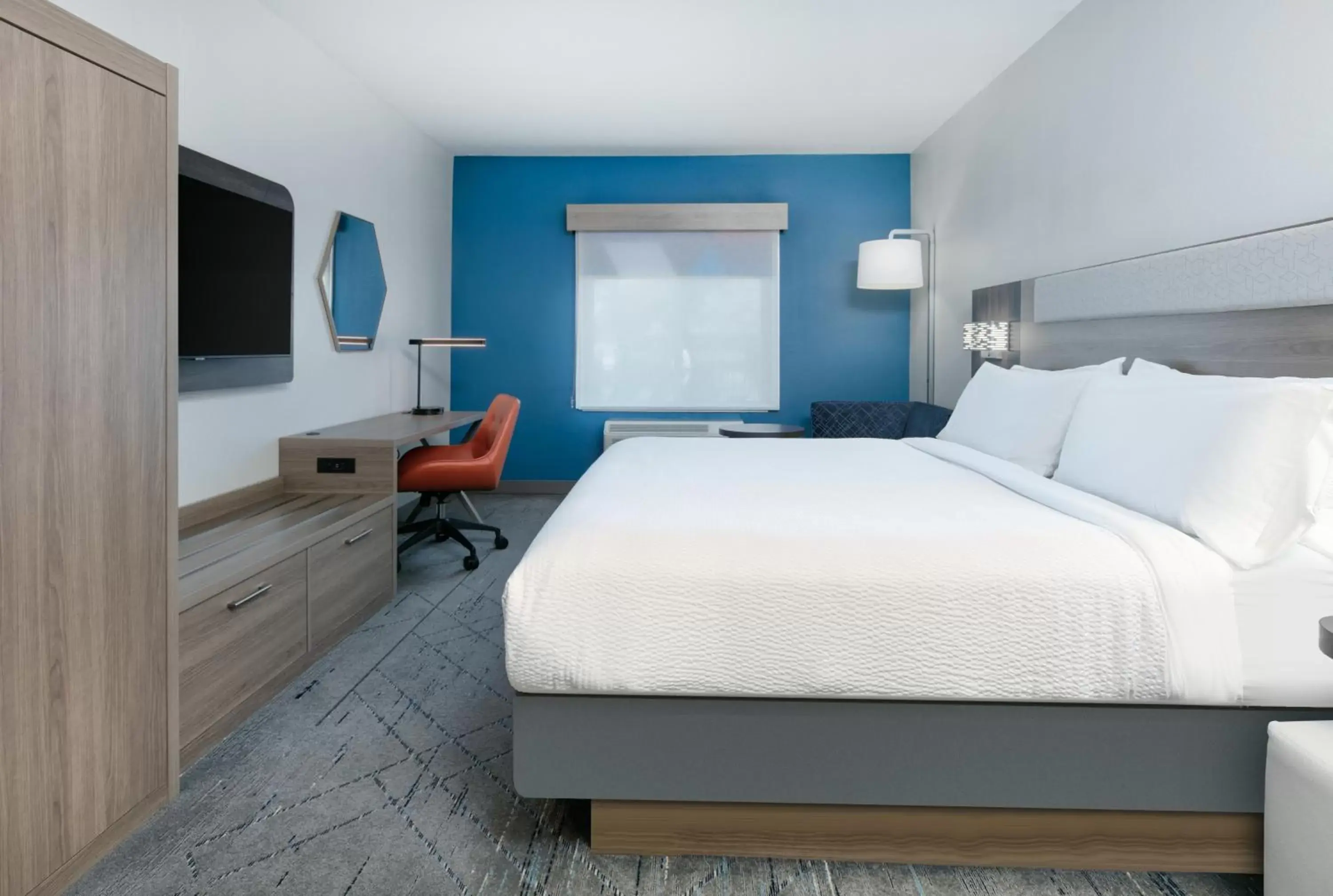 Bedroom in Holiday Inn Express & Suites - Dallas Park Central Northeast, an IHG Hotel