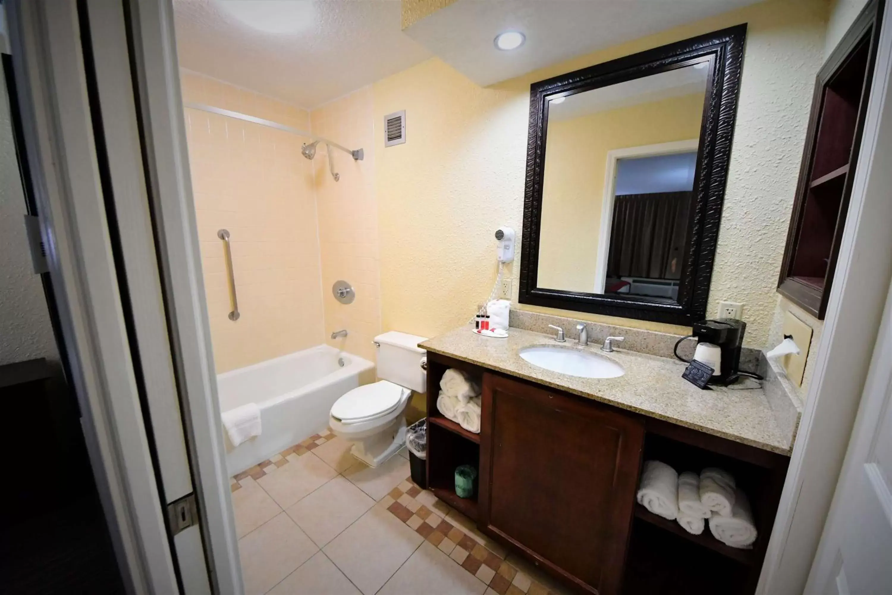 Bathroom in Ramada by Wyndham Jacksonville Hotel & Conference Center