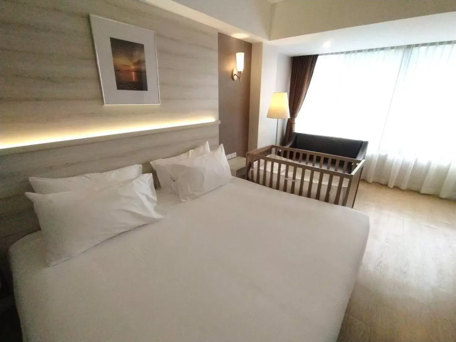 Bed in The Farm House Hotel Ranong