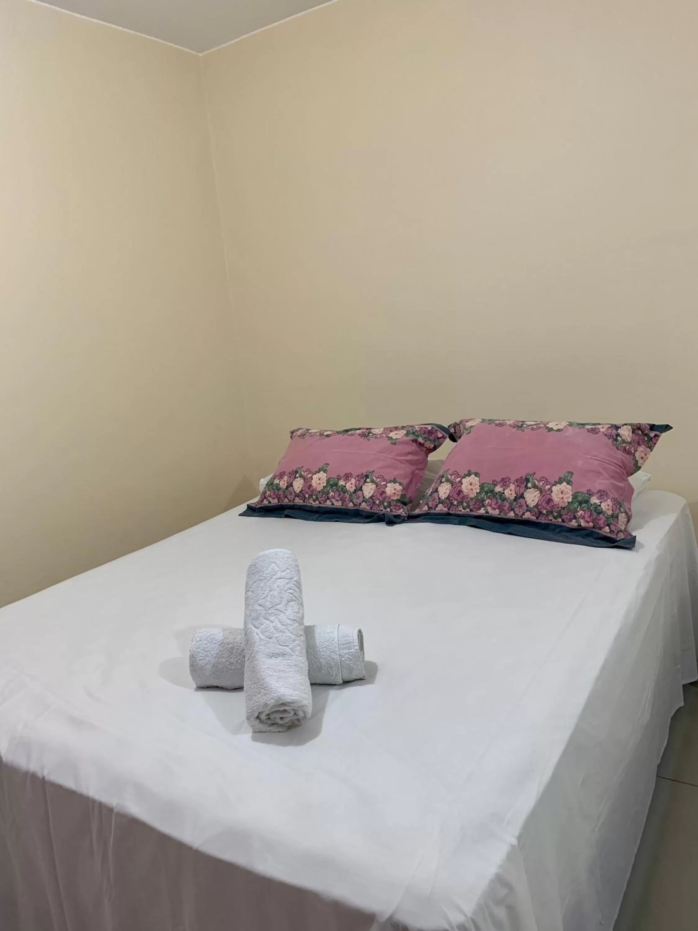 Bed in Pousada Jardim Brasília