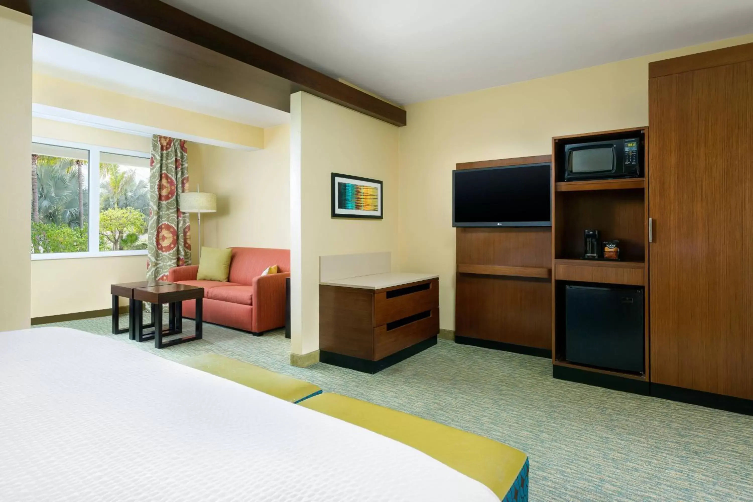 Bedroom, TV/Entertainment Center in Fairfield Inn & Suites by Marriott Key West at The Keys Collection