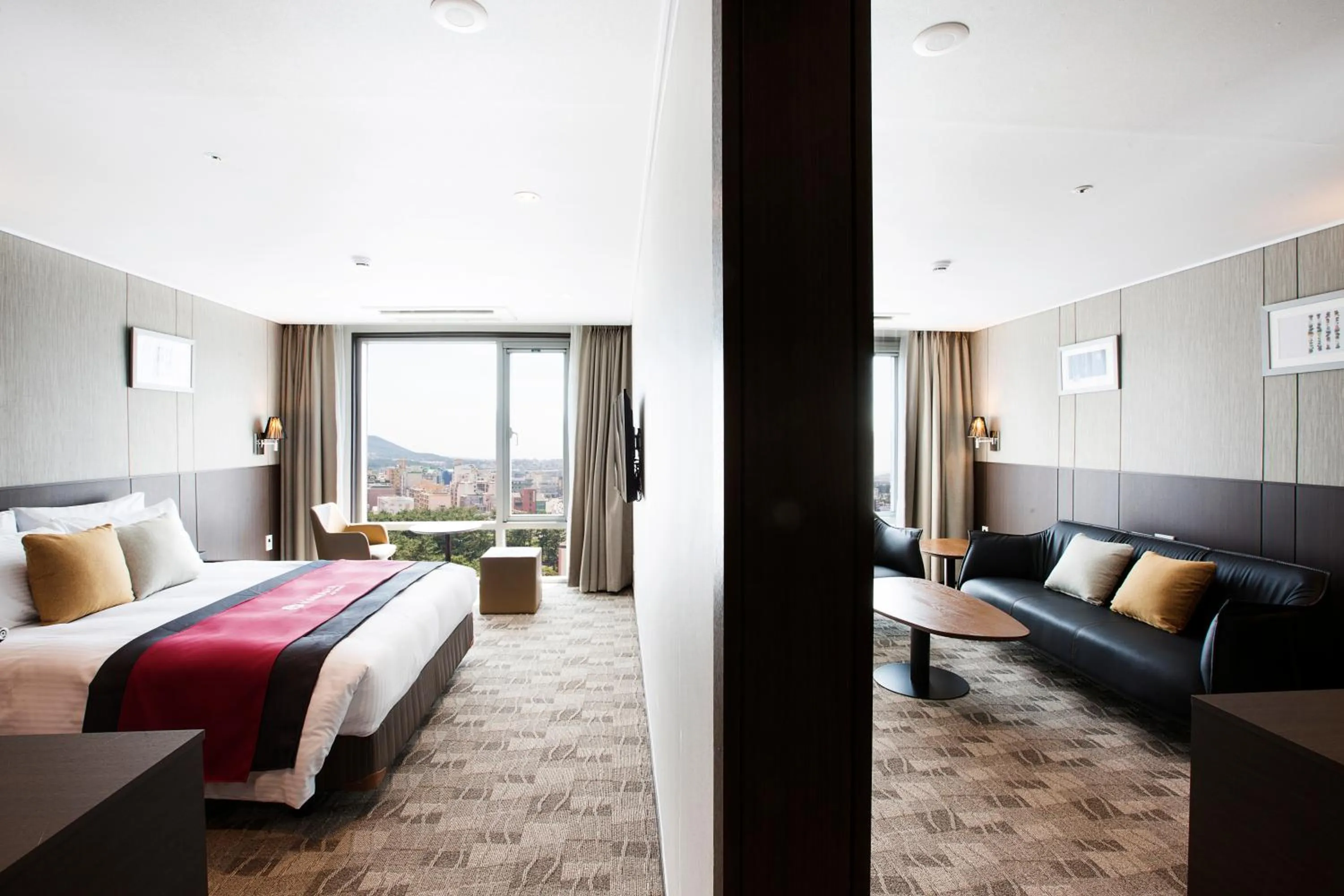 Bed in Ramada by Wyndham Jeju City Hall