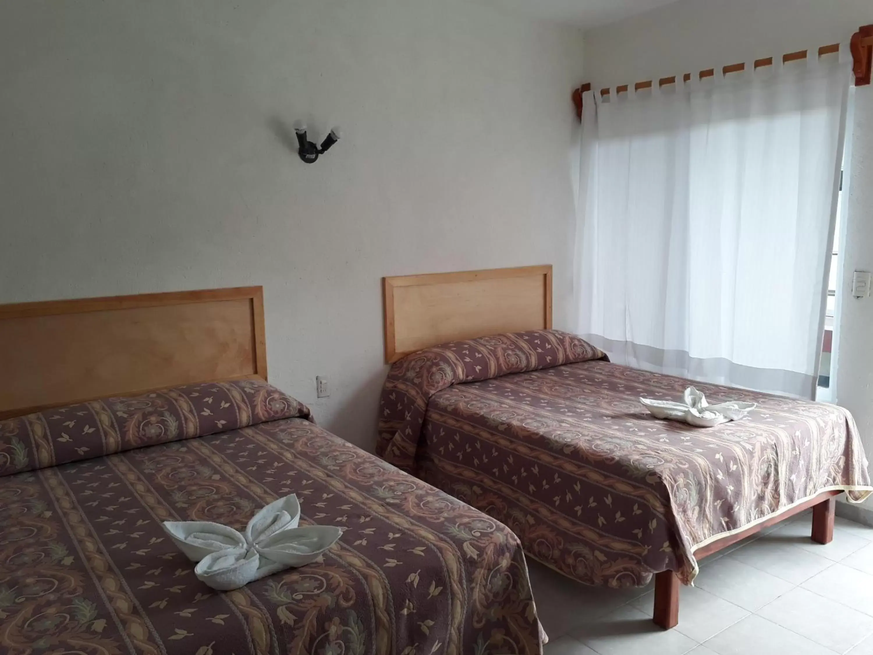 Bed in Hotel Quinta Paraiso