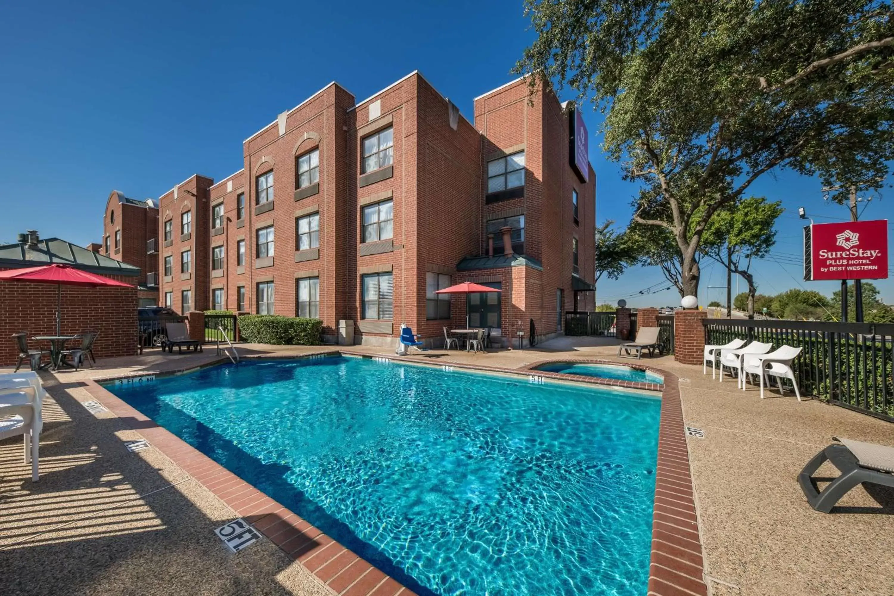Pool view, Property Building in SureStay Plus Hotel by Best Western Plano