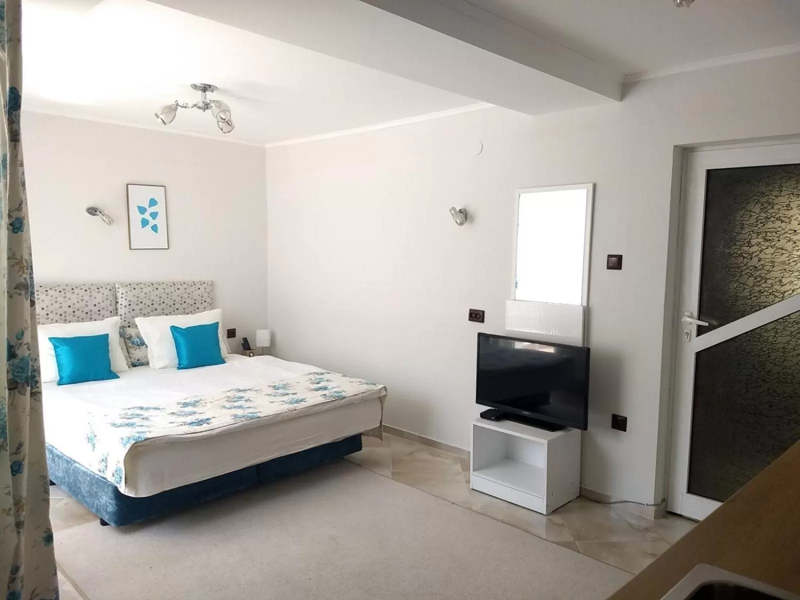 Bed in White Rose Guest Rooms