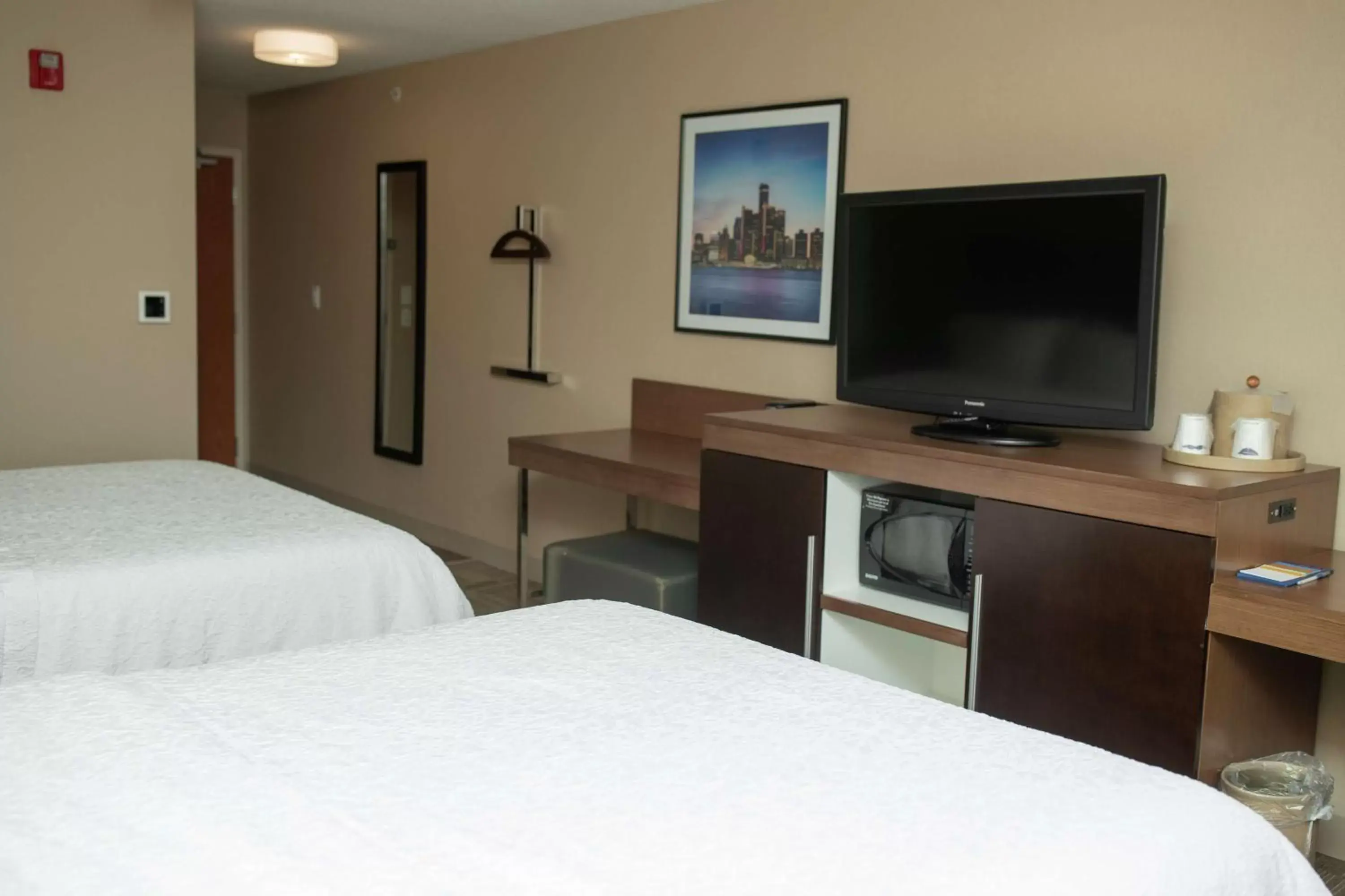 Bedroom, TV/Entertainment Center in Hampton Inn Commerce/Novi