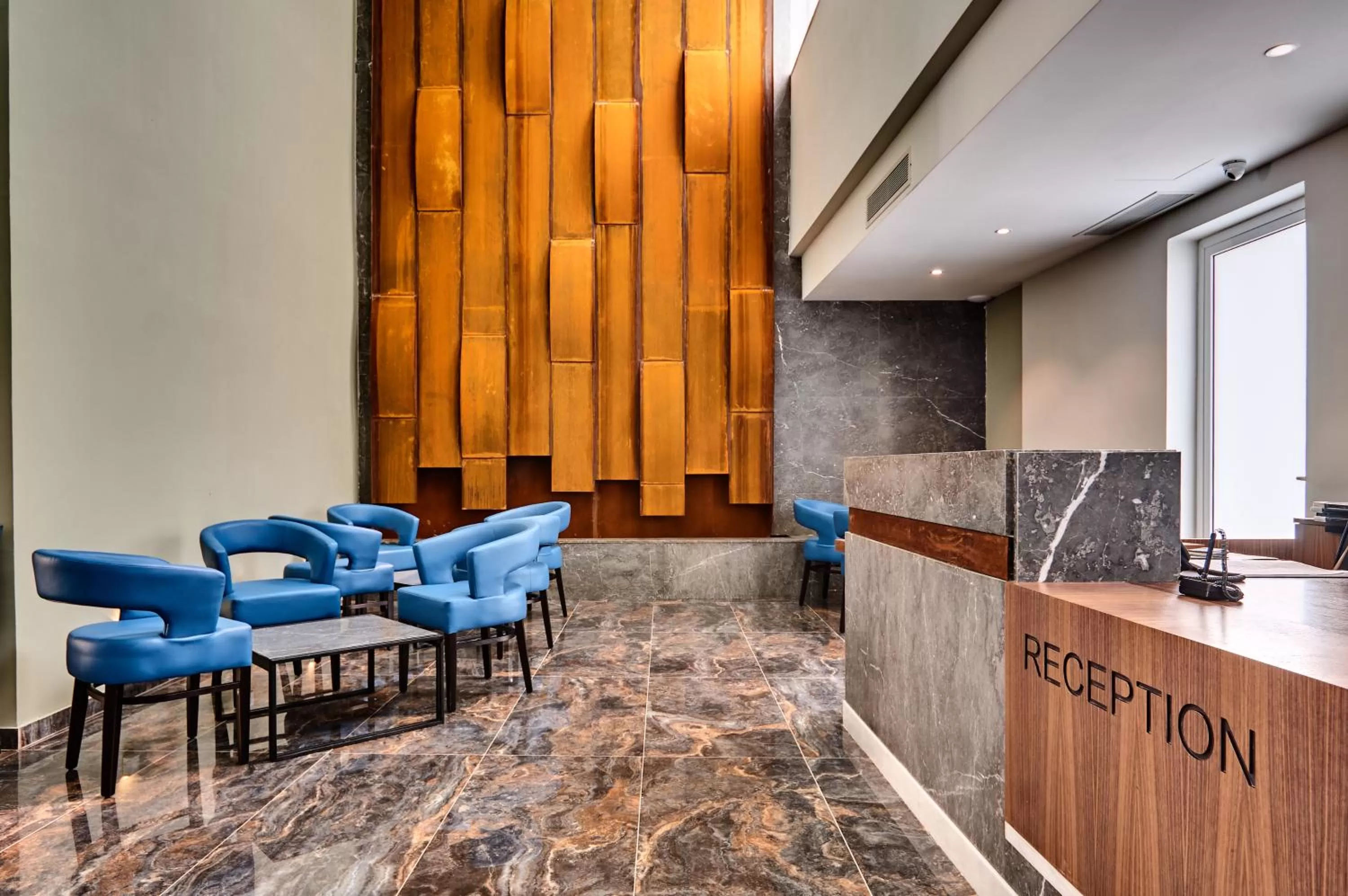 Lobby or reception in The District Hotel