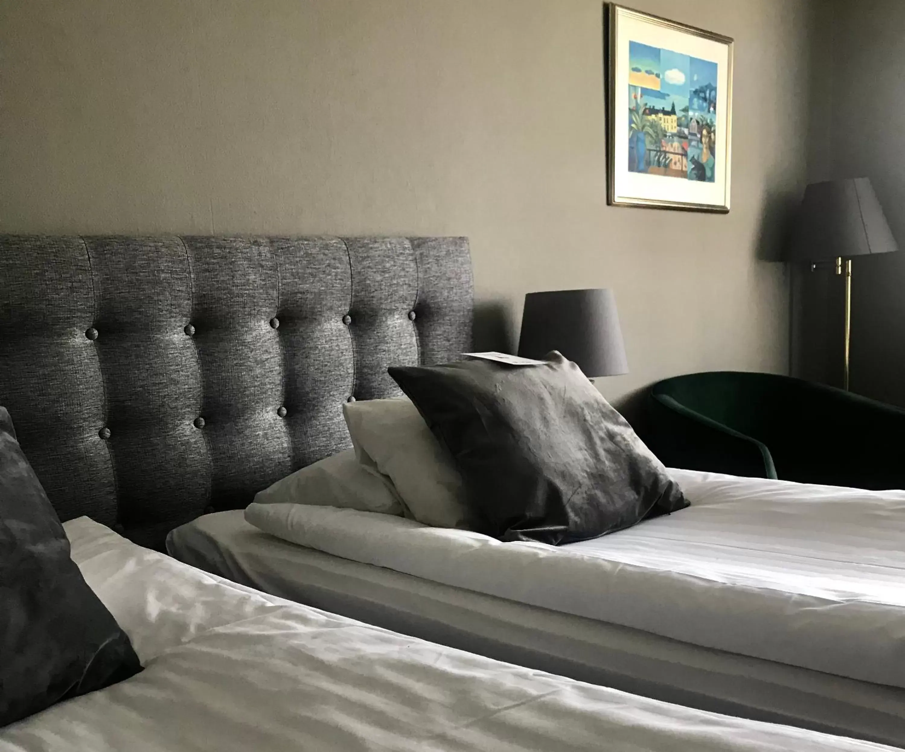 Bed, Seating Area in Best Western Motala Stadshotell