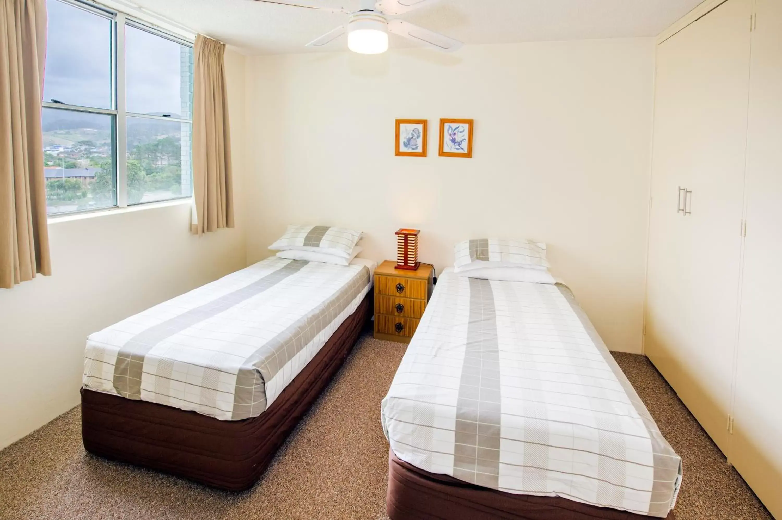 Bed in Tradewinds Apartments
