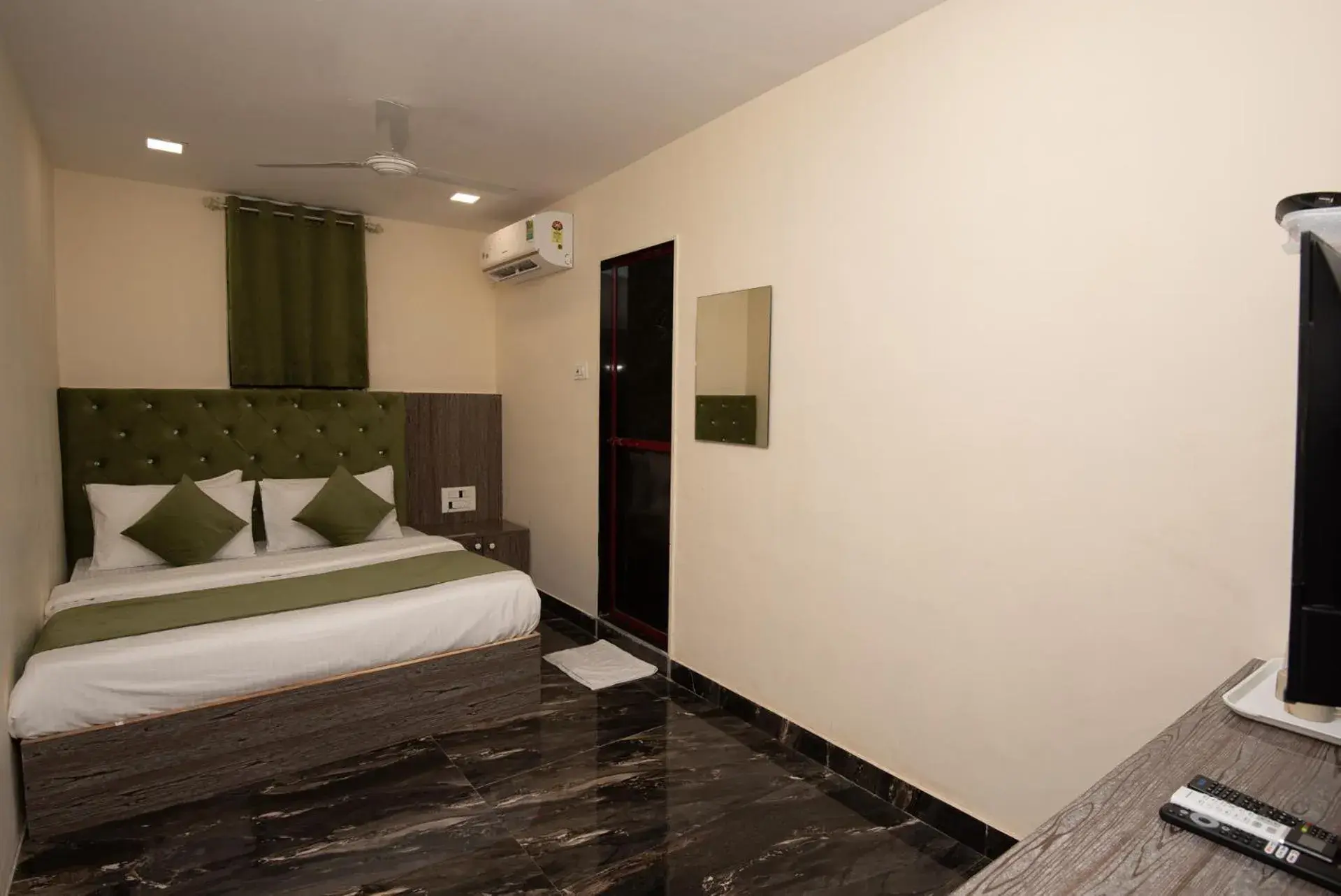 Bed in Hotel Priceless Suite-Nesco Exhibition Goregaon