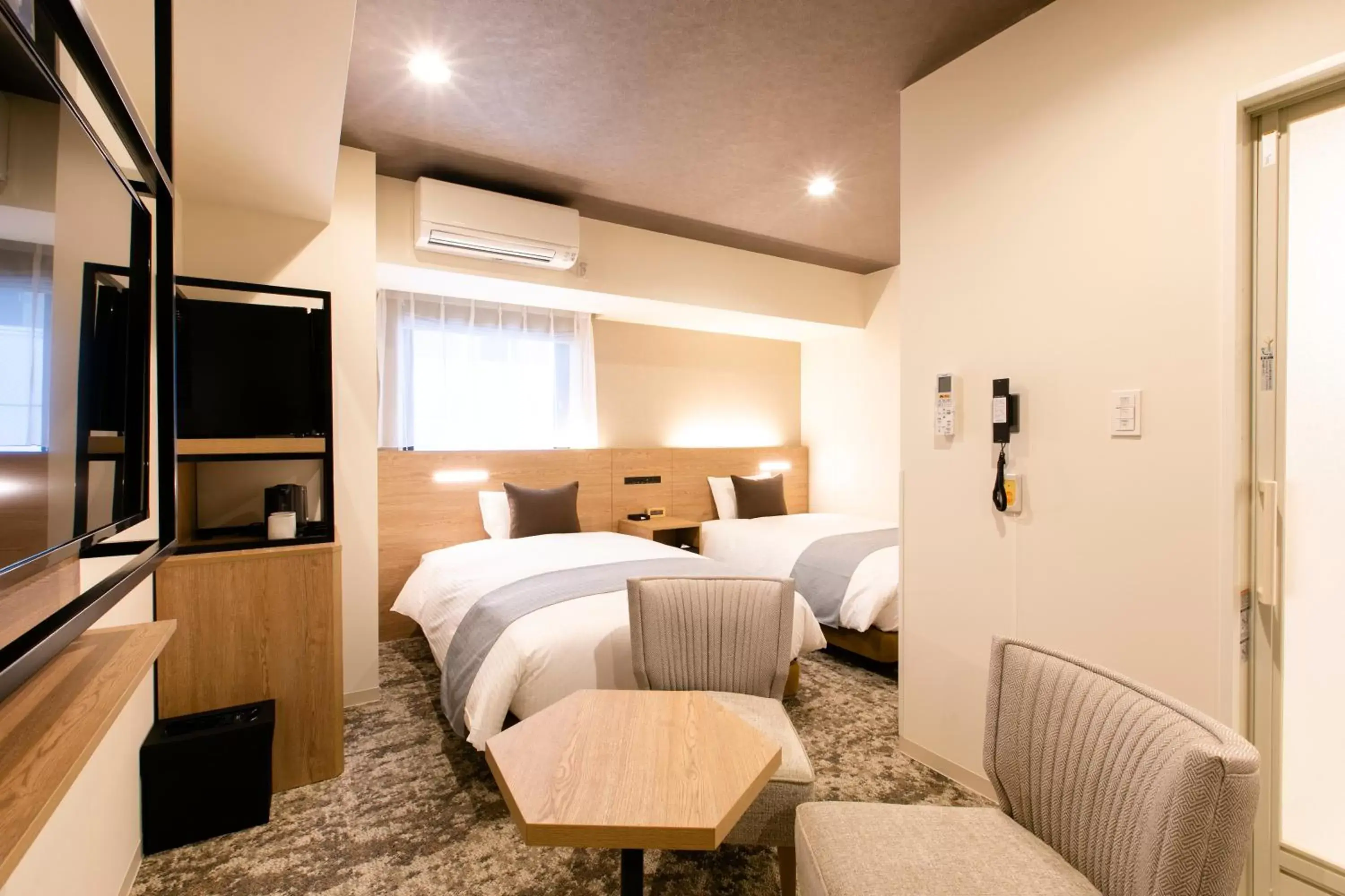 Photo of the whole room, Bed in Hotel Wing International Sapporo Susukino