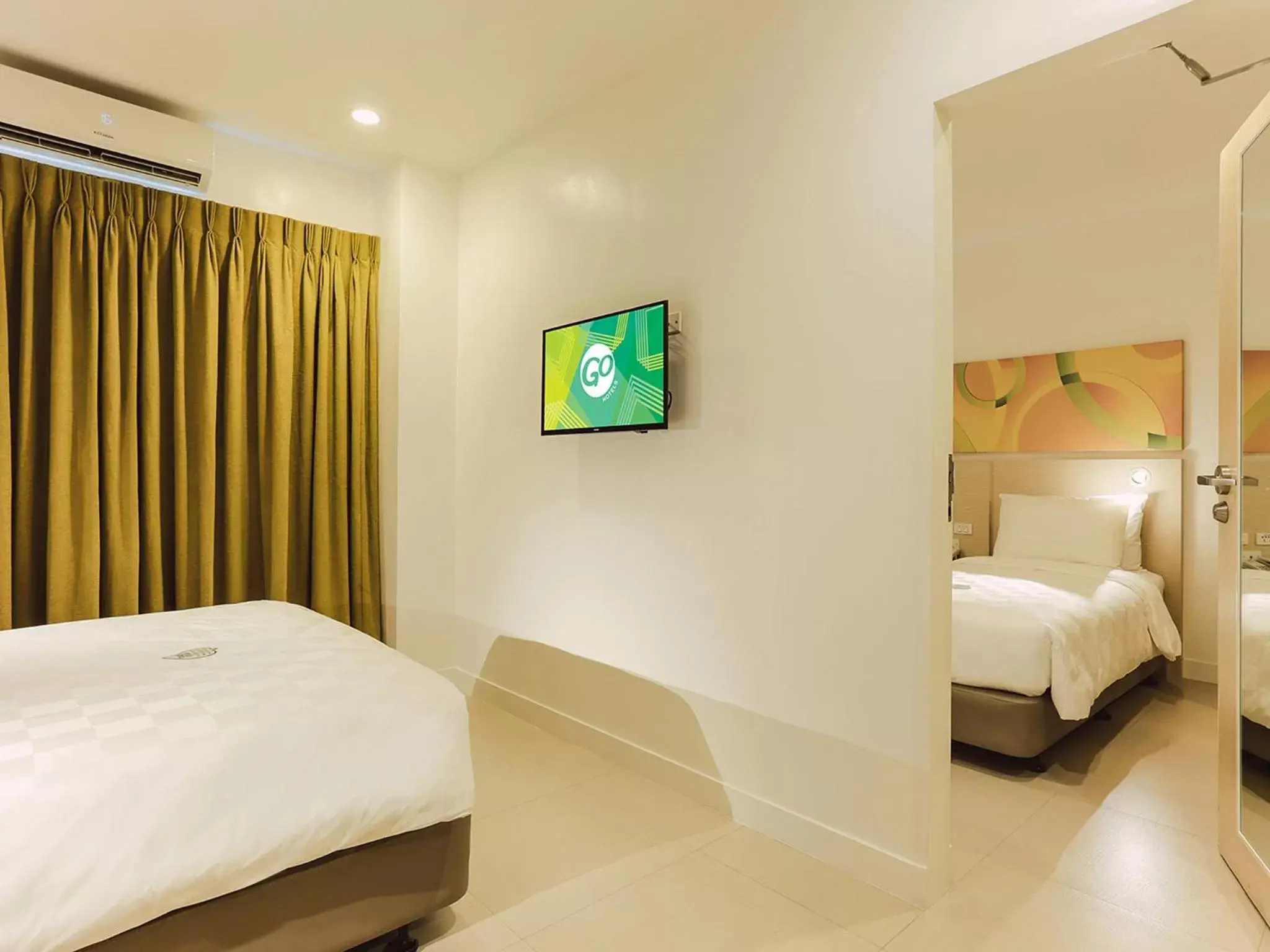 Property building, Bed in Go Hotels North EDSA