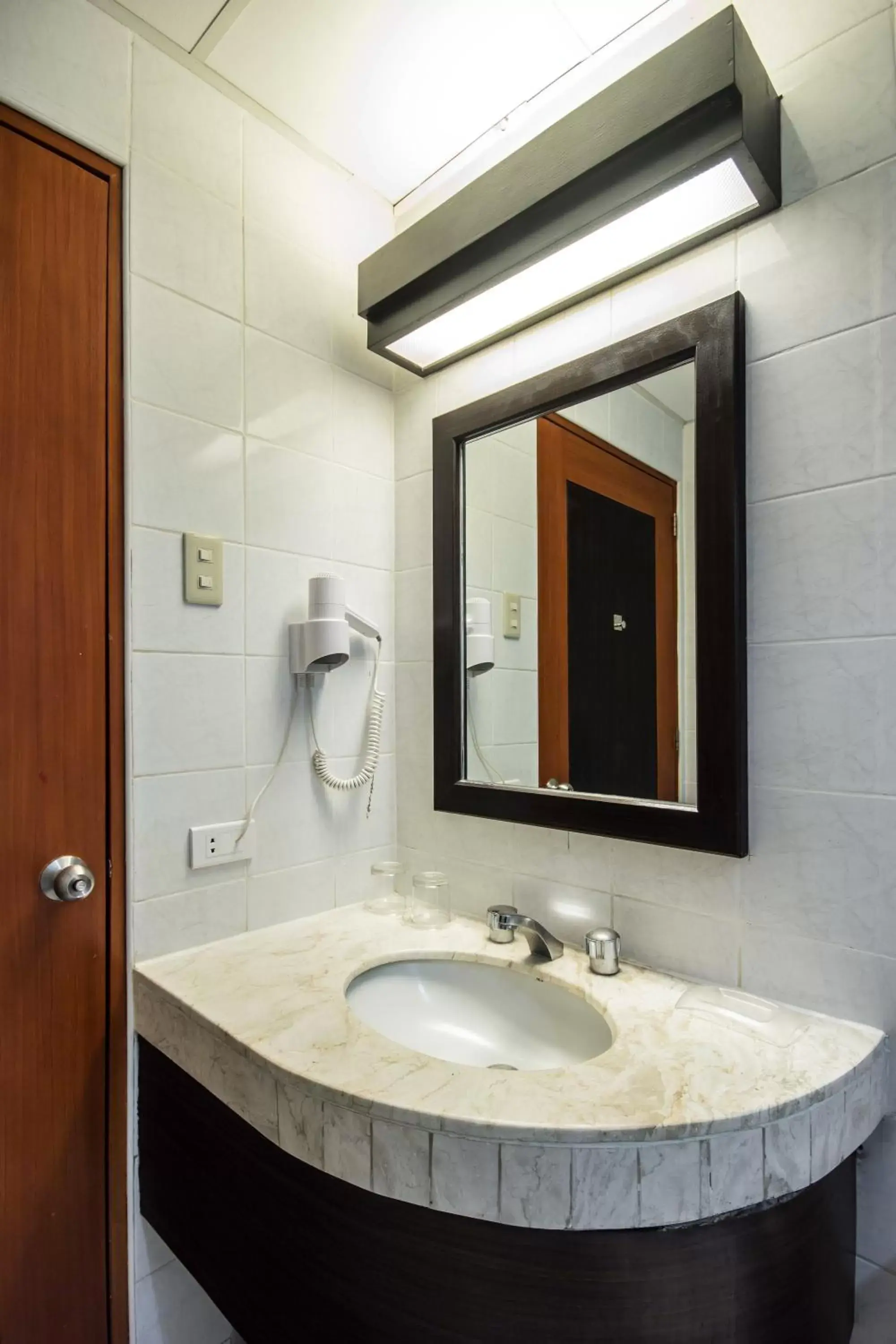 Bathroom in Microtel by Wyndham Batangas