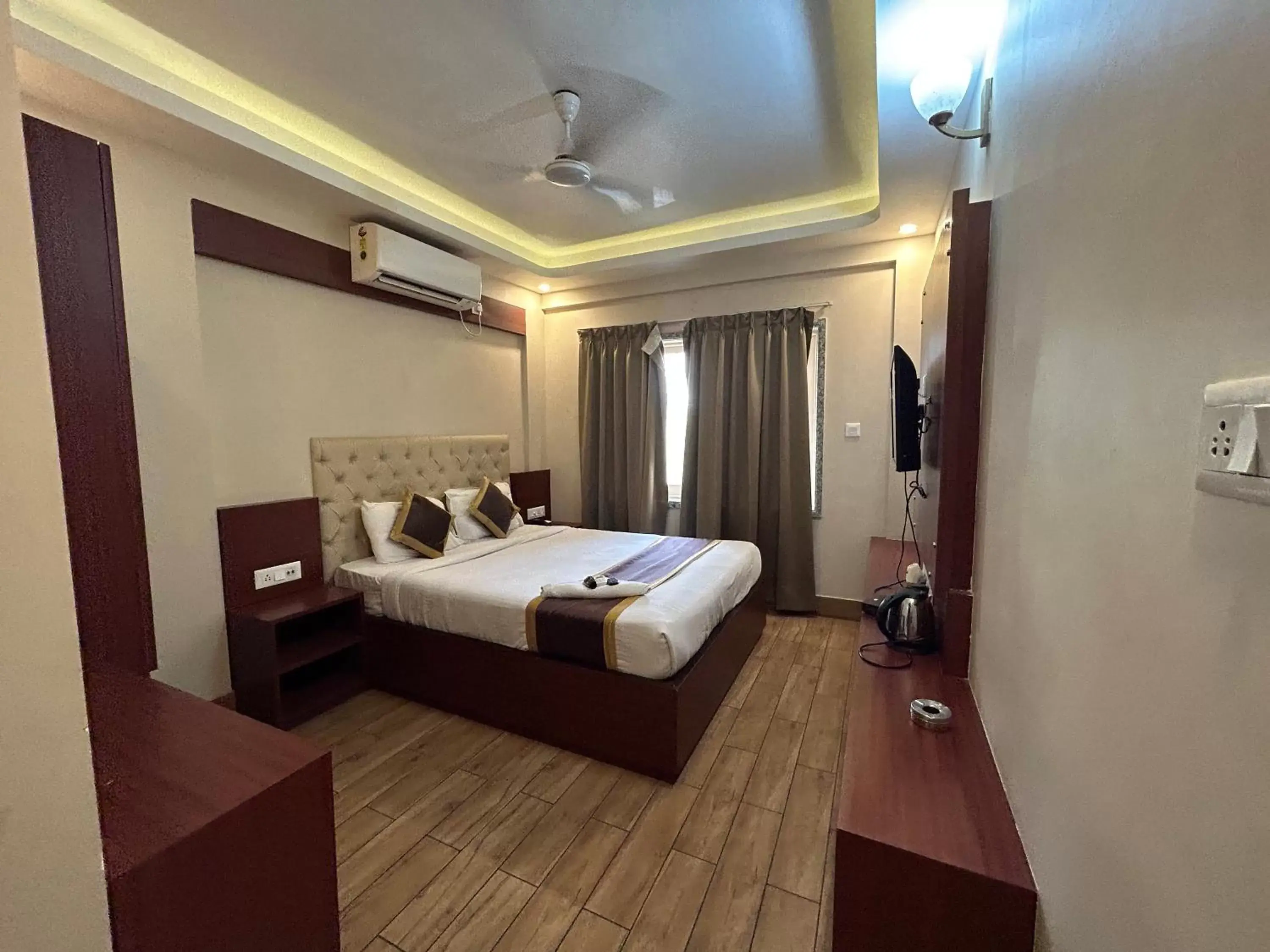 Bed in The Aster Enclave Hotel Bed in The Aster Enclave Hotel