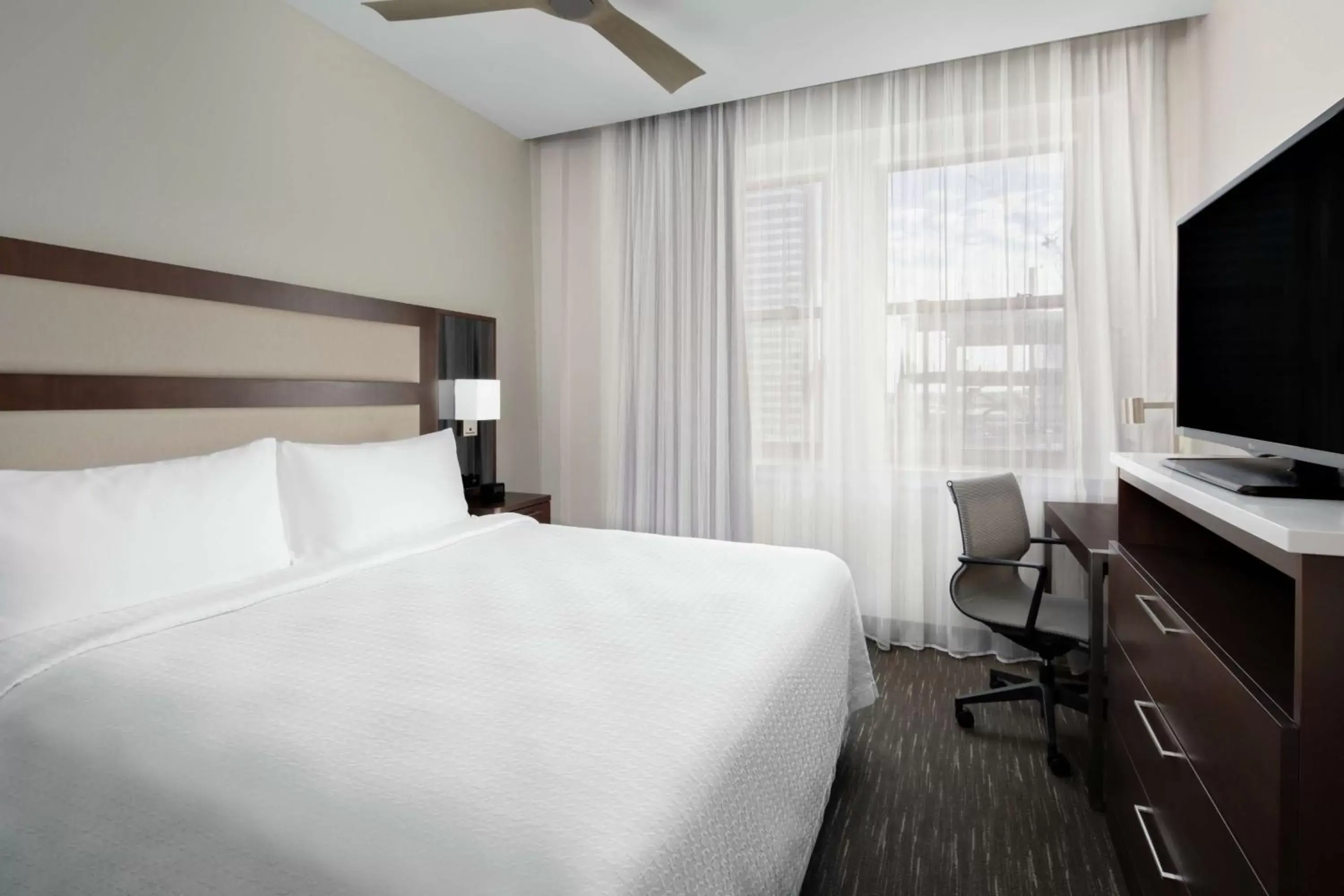 Bed in Homewood Suites by Hilton Nashville Downtown