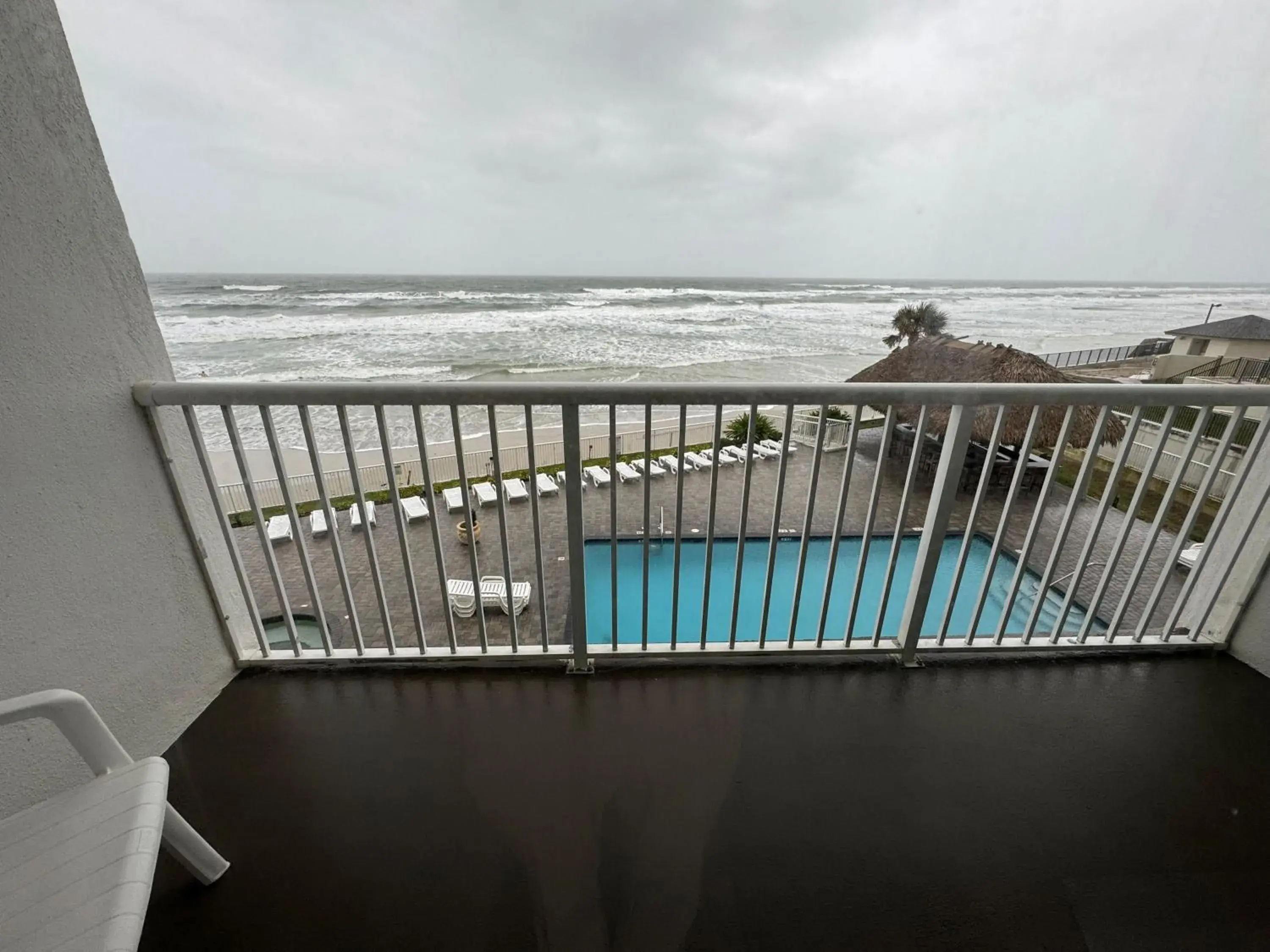 Balcony/Terrace, Pool View in Emerald Shores Hotel - Daytona Beach